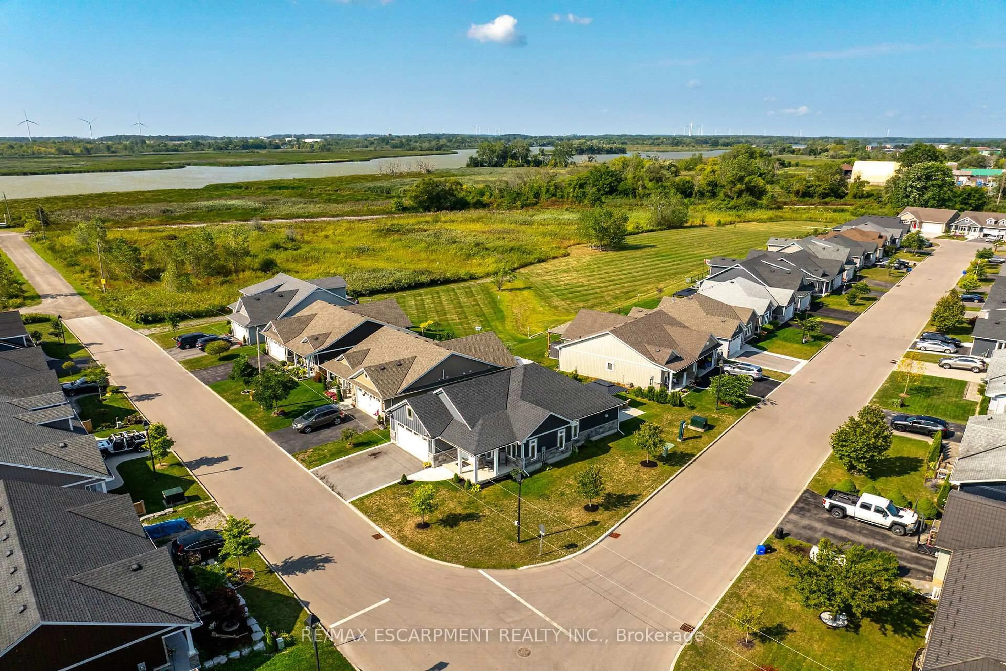 A pic from outside/outdoor area/front of a property/back of a property/a pic from drone, water/lake/river/ocean view for 740 Main St #24, Haldimand Ontario N1A 0B3