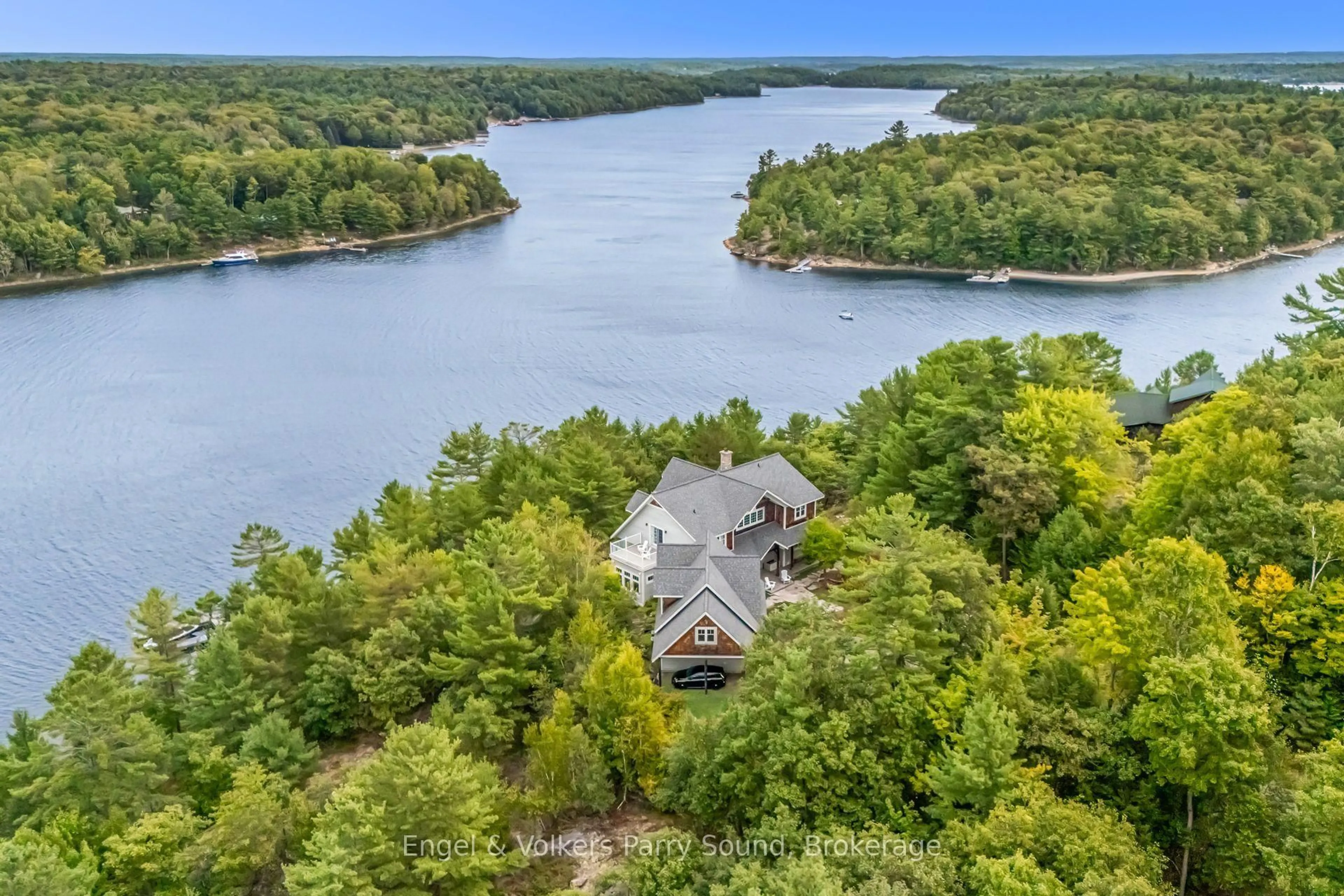 A pic from outside/outdoor area/front of a property/back of a property/a pic from drone, water/lake/river/ocean view for 22 Beacon Point Dr, Carling Ontario P0G 1G0