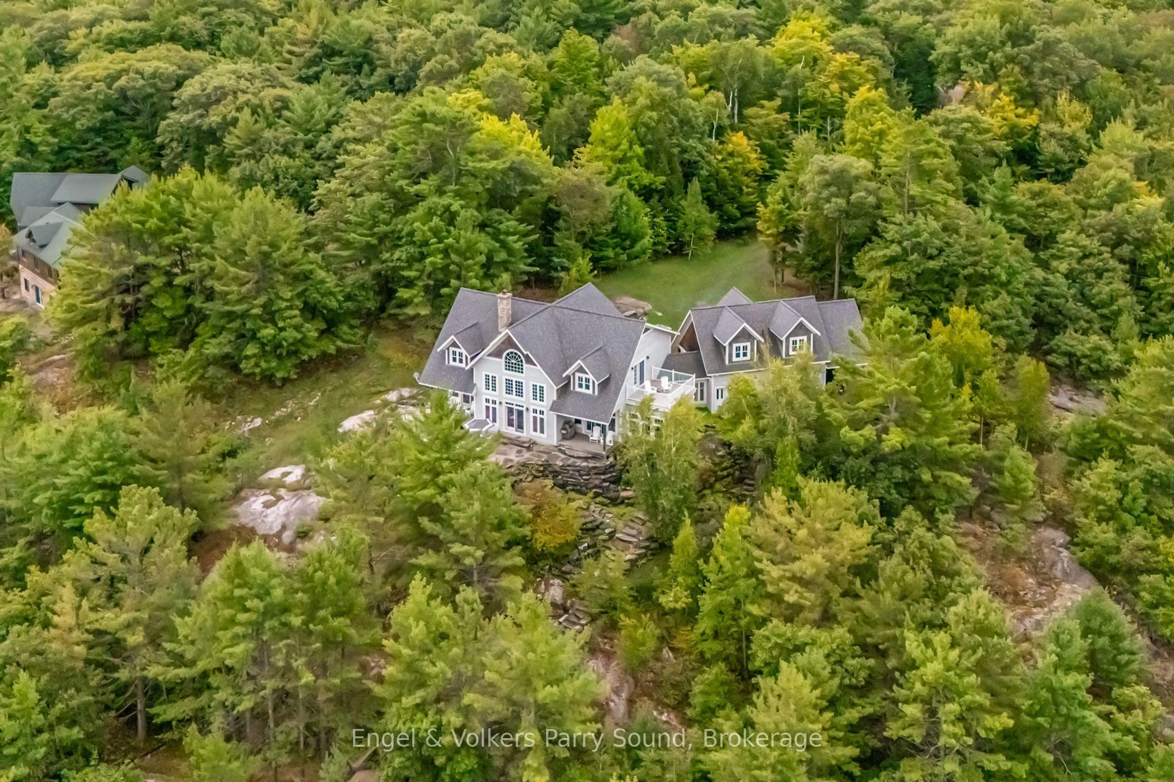 A pic from outside/outdoor area/front of a property/back of a property/a pic from drone, forest/trees view for 22 Beacon Point Dr, Carling Ontario P0G 1G0