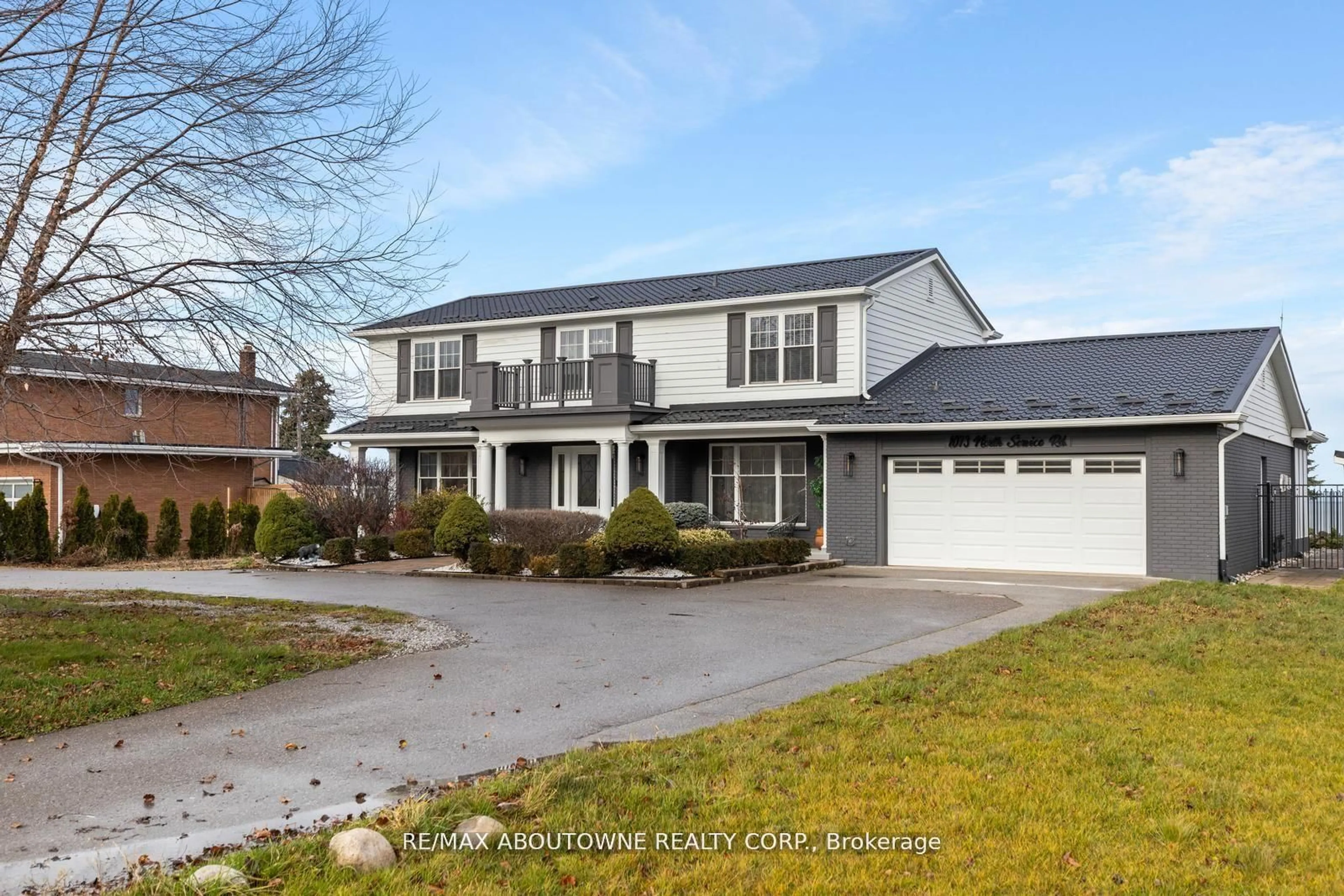 Home with vinyl exterior material, street for 1073 North Service Rd, Hamilton Ontario L8E 5E1