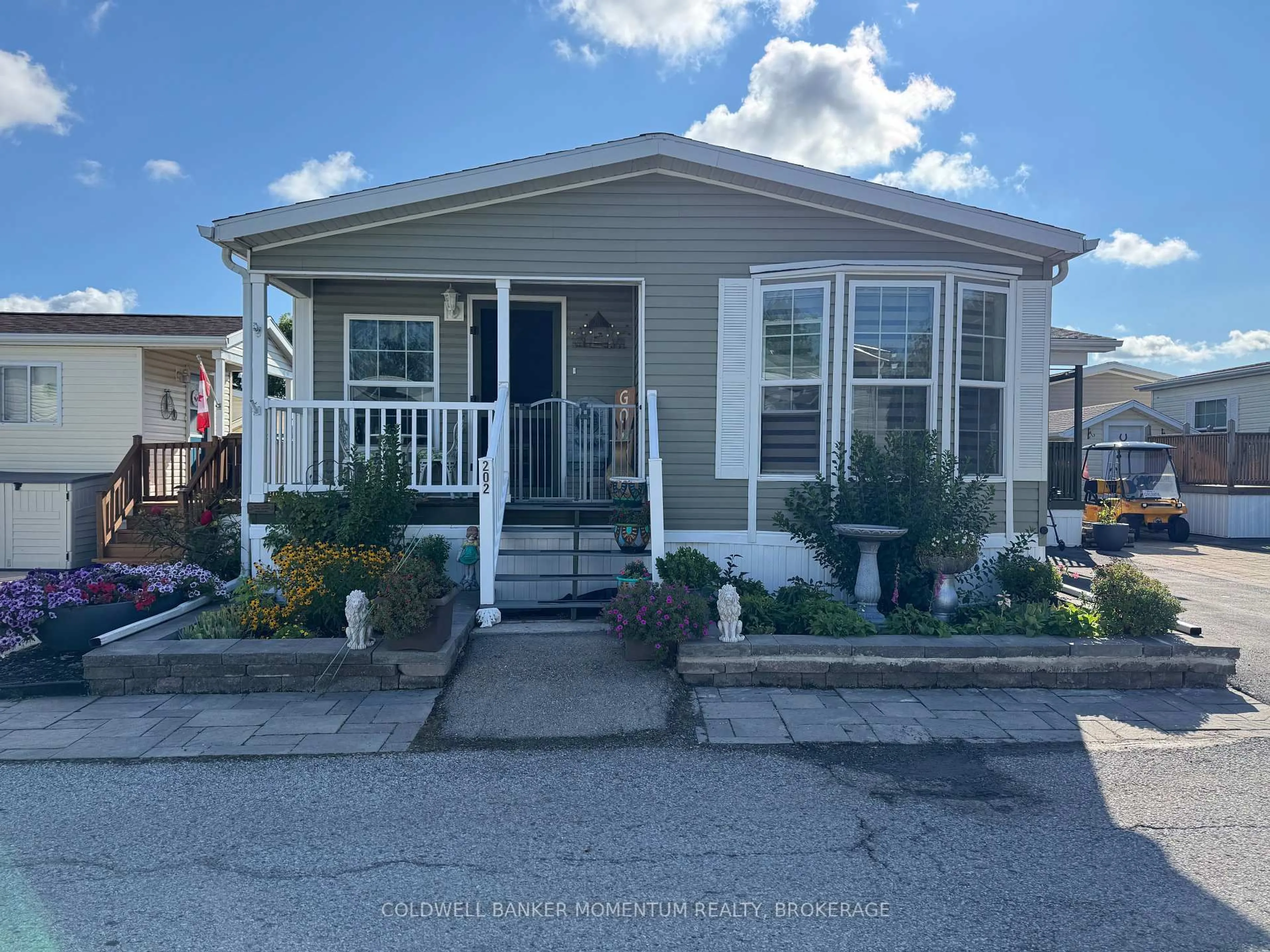 Home with vinyl exterior material, street for 202 3033 Townline Rd, Stevensville Rd, Fort Erie Ontario L0S 1S1