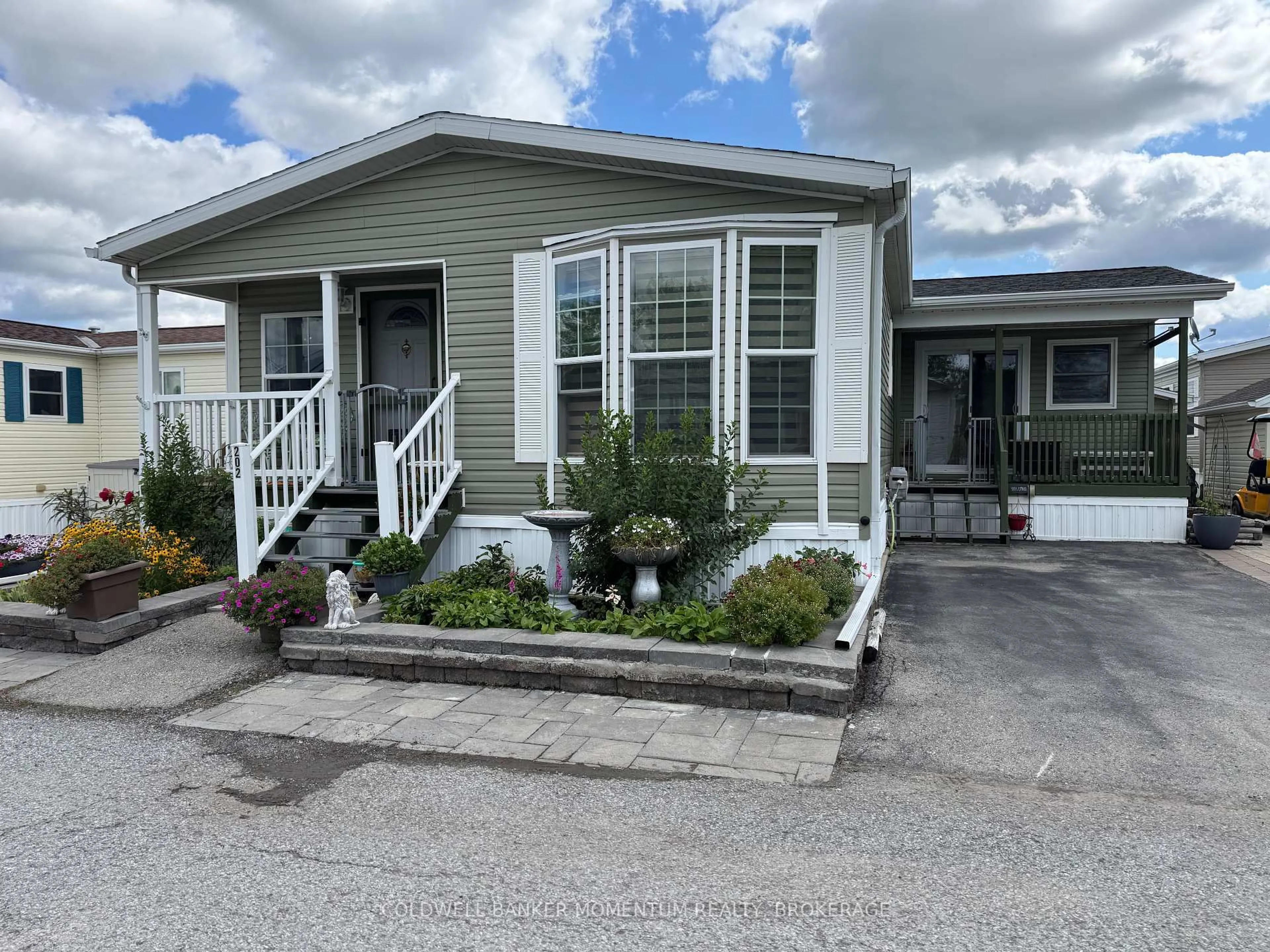 Home with vinyl exterior material, street for 202 3033 Townline Rd, Stevensville Rd, Fort Erie Ontario L0S 1S1