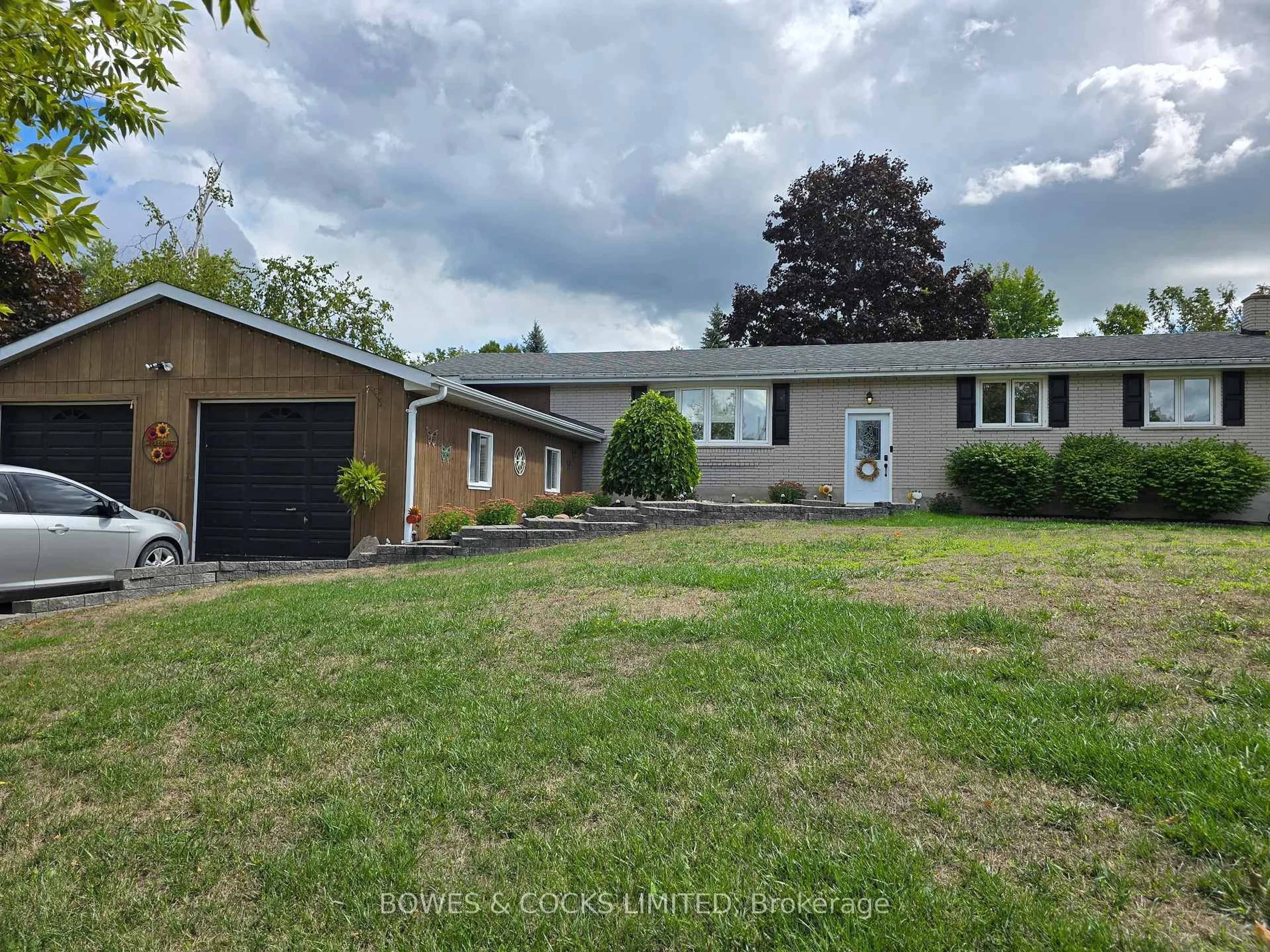 Home with vinyl exterior material, street for 33 Maple Grove Rd, Kawartha Lakes Ontario K9V 4R6