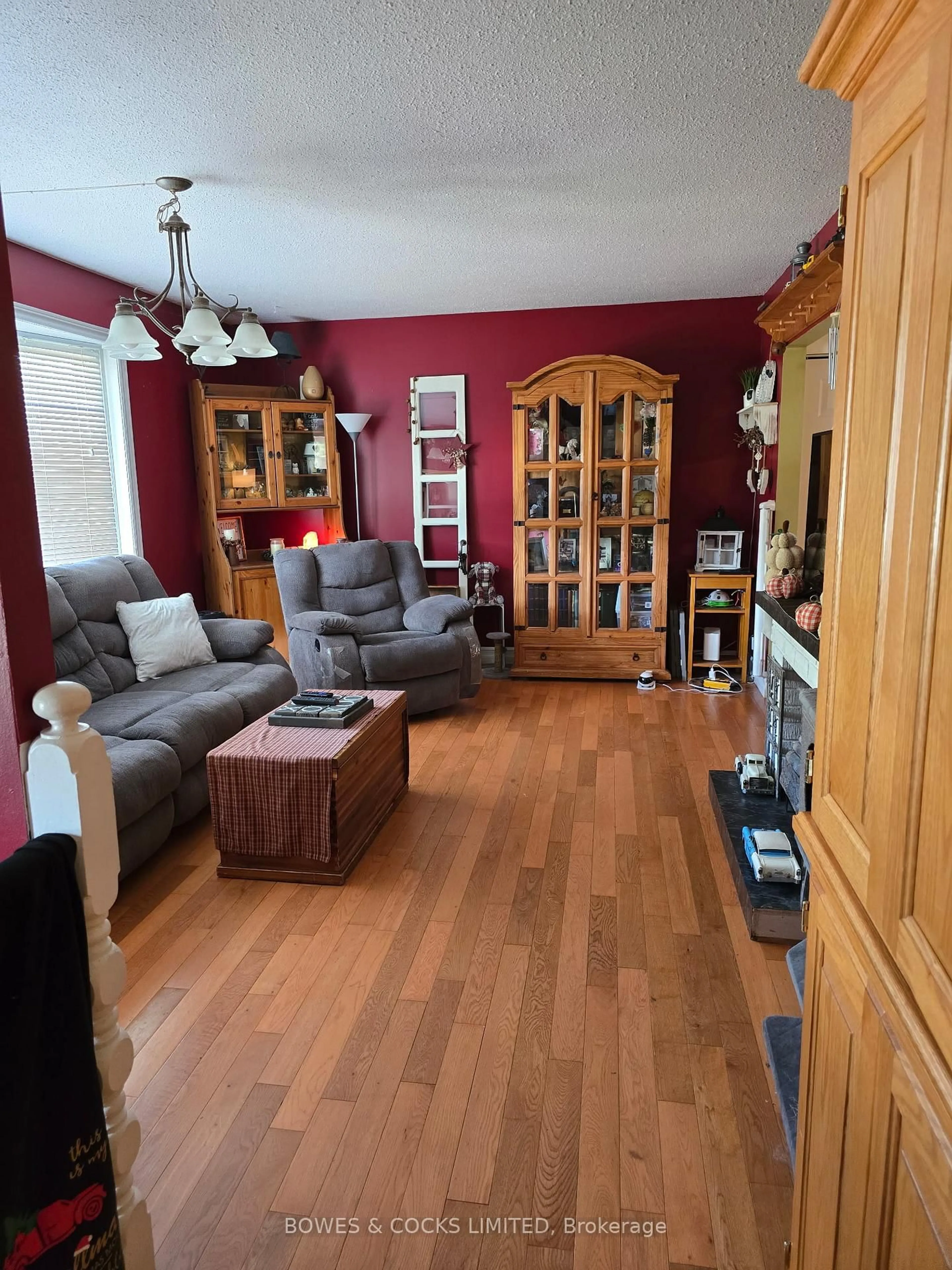 Living room with furniture, wood/laminate floor for 33 Maple Grove Rd, Kawartha Lakes Ontario K9V 4R6