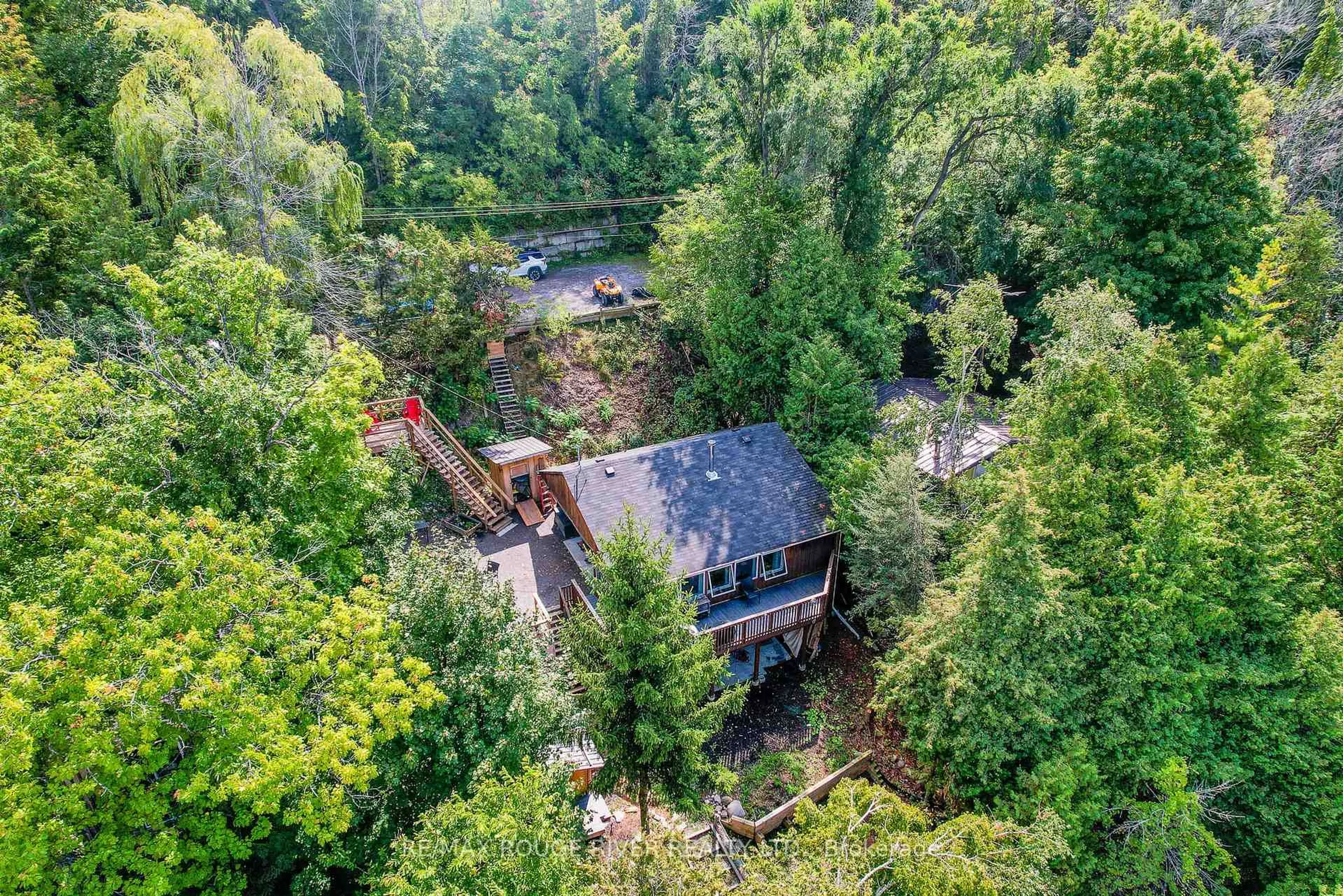 A pic from outside/outdoor area/front of a property/back of a property/a pic from drone, forest/trees view for 68 Robins Rd #156, Alnwick/Haldimand Ontario K0L 1Y0