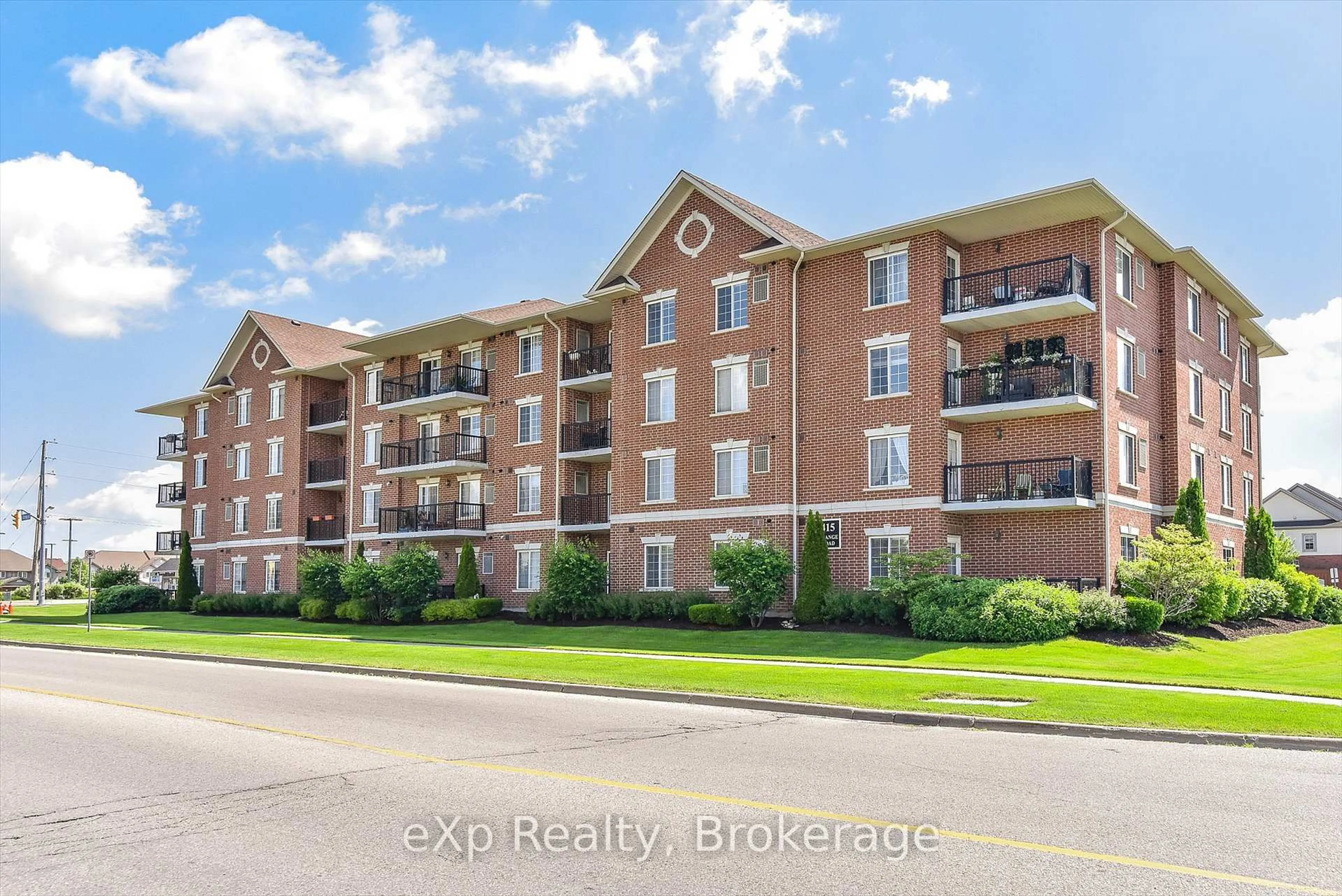 A pic from outside/outdoor area/front of a property/back of a property/a pic from drone, water/lake/river/ocean view for 415 Grange Rd #212, Guelph Ontario N1E 0C4