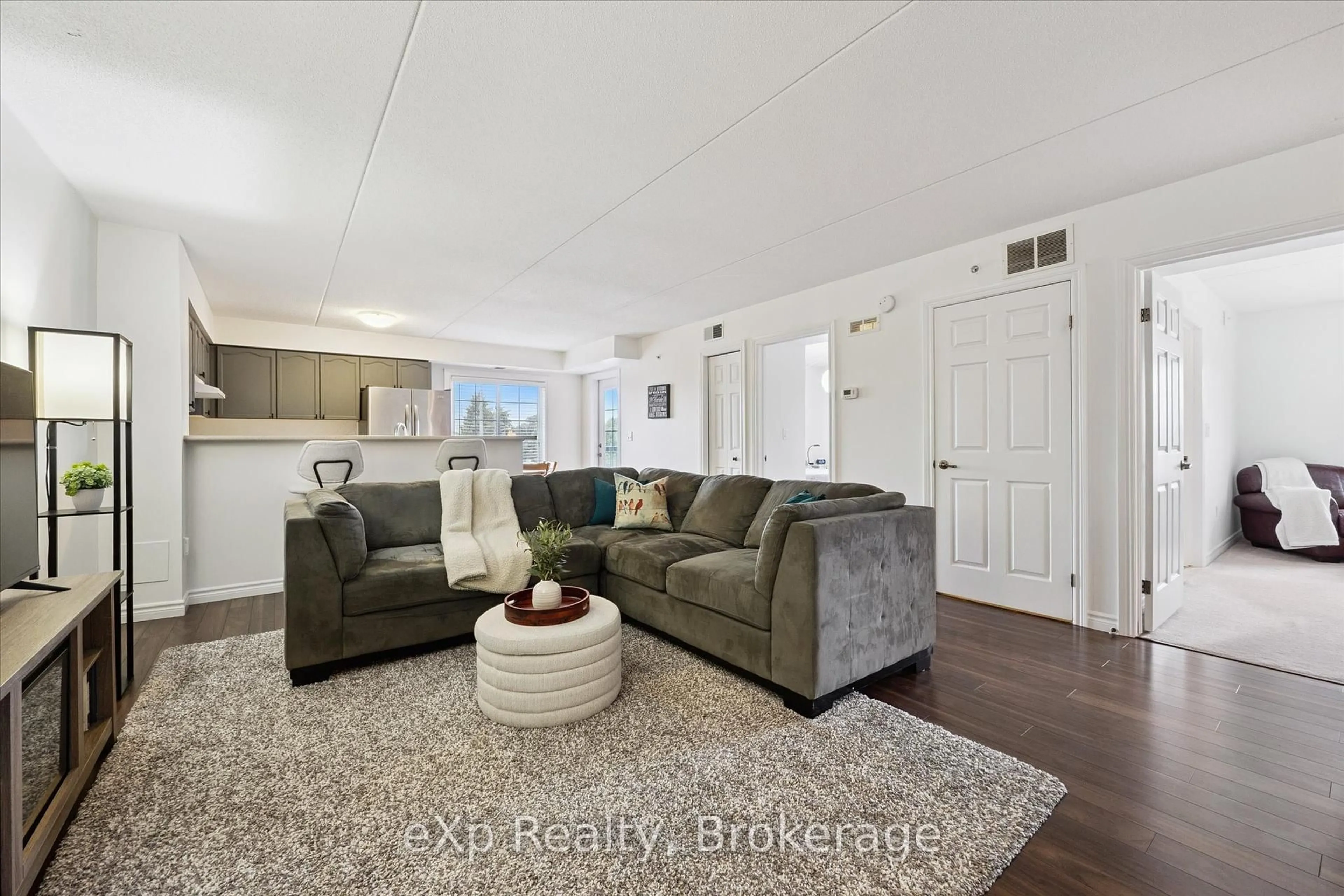 Living room with furniture, unknown for 415 Grange Rd #212, Guelph Ontario N1E 0C4