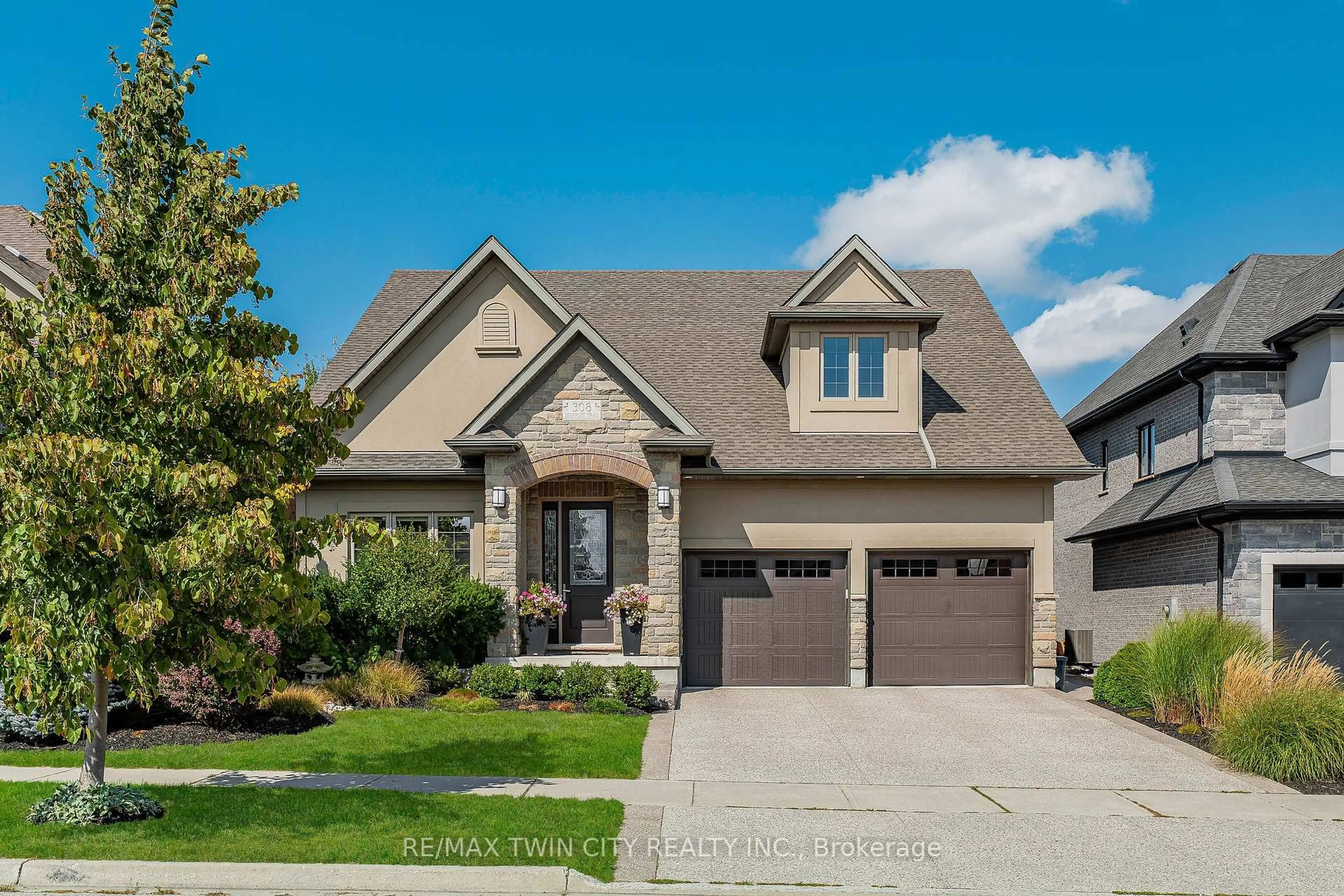 Home with brick exterior material, street for 308 Deerfoot Tr, Waterloo Ontario N2K 0B3