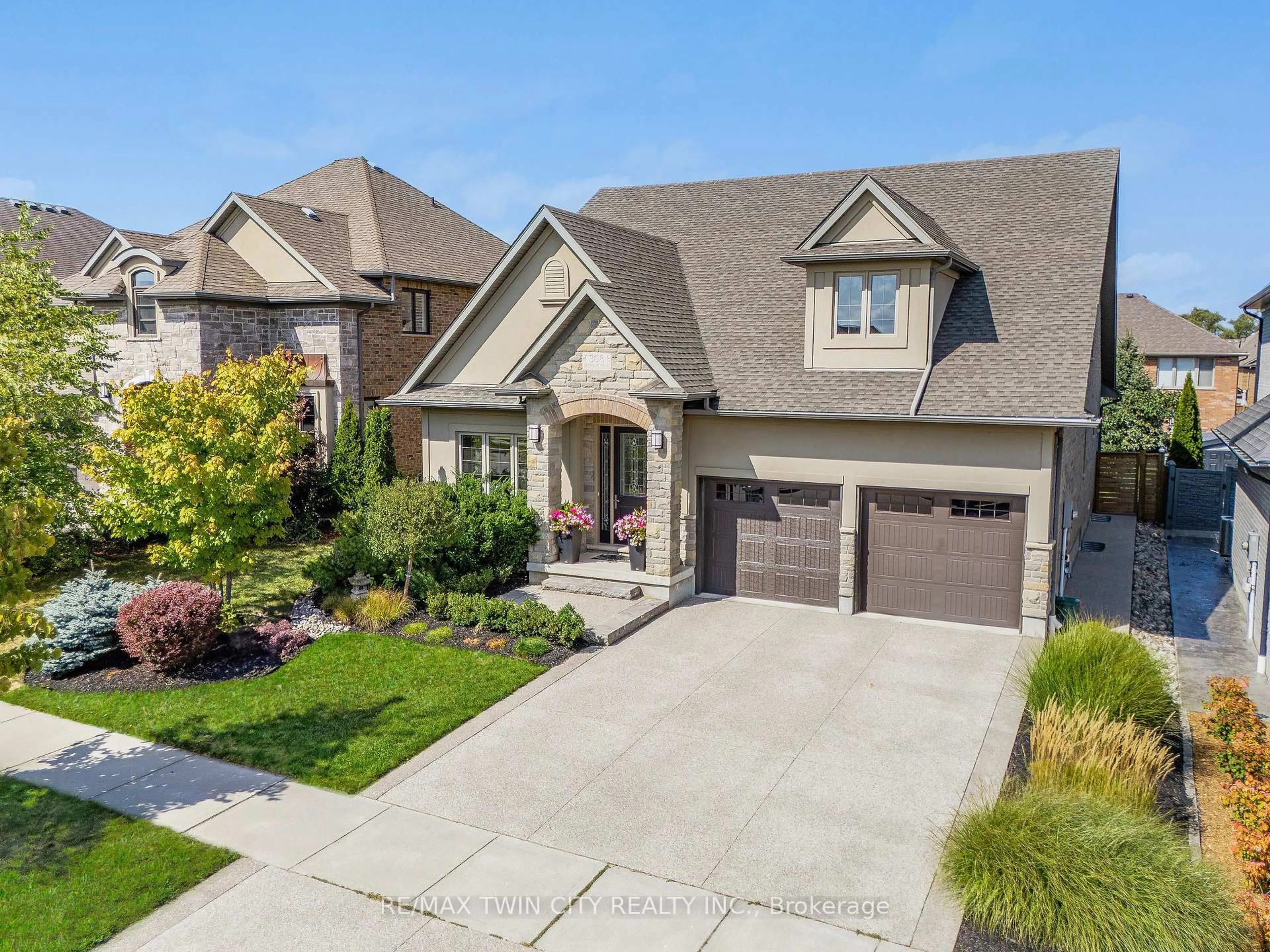 Home with brick exterior material, street for 308 Deerfoot Tr, Waterloo Ontario N2K 0B3