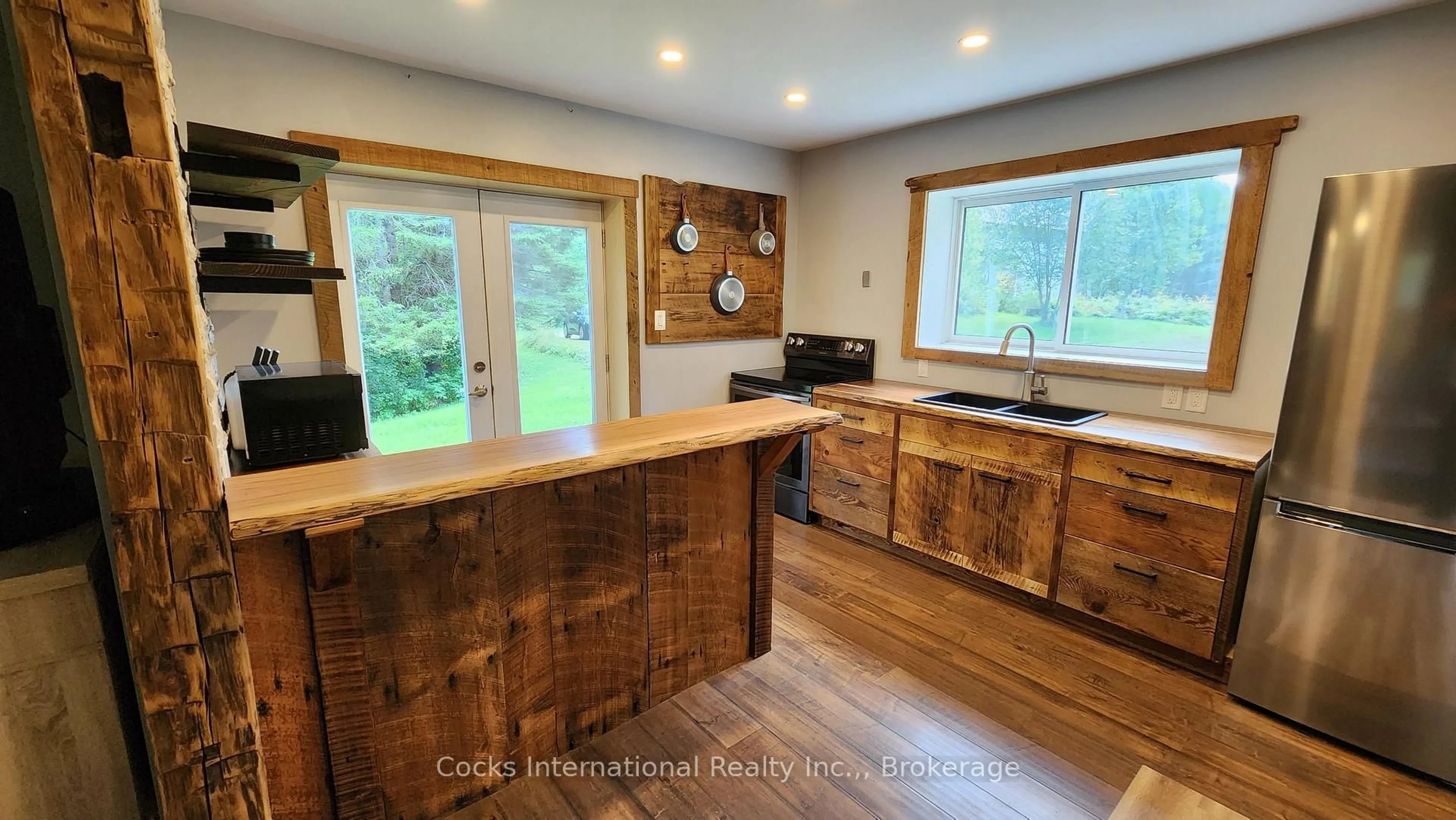Open concept kitchen, wood/laminate floor for 96 Pickerel & Jack Lake Rd, Armour Ontario P0A 1C0