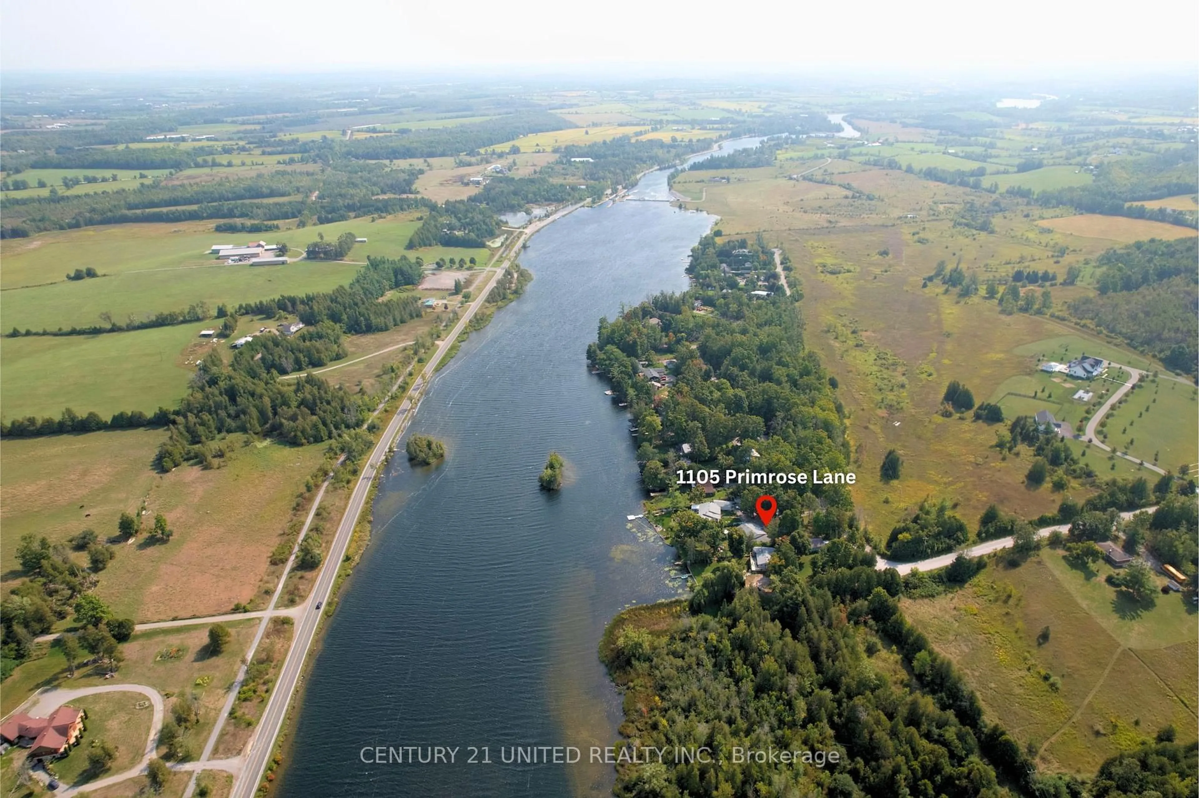 A pic from outside/outdoor area/front of a property/back of a property/a pic from drone, water/lake/river/ocean view for 1105 Primrose Lane, Selwyn Ontario K9J 6X5