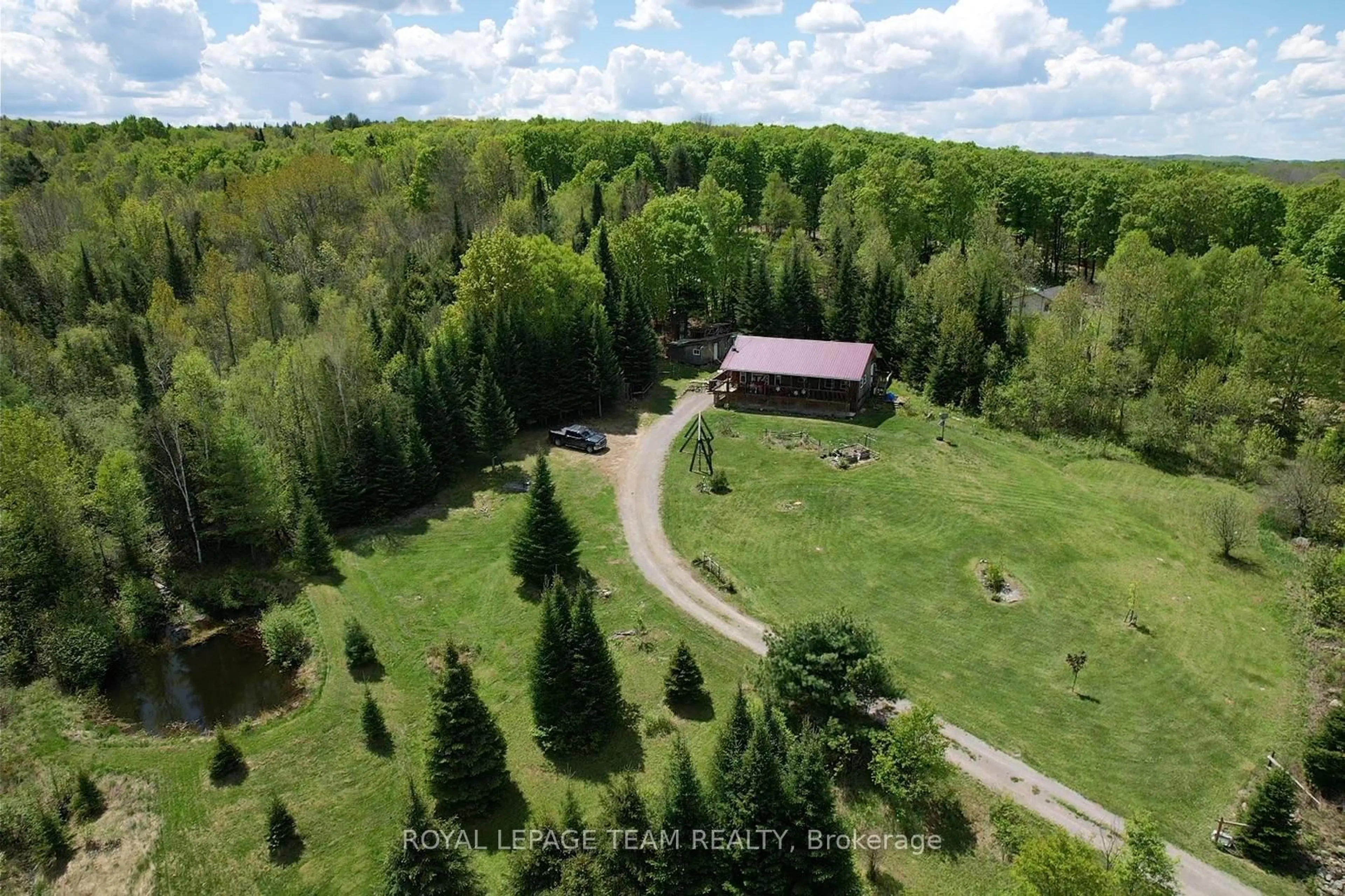 A pic from outside/outdoor area/front of a property/back of a property/a pic from drone, forest/trees view for 105 Heins Rd, Palmer Rapids Ontario K0J 2E0