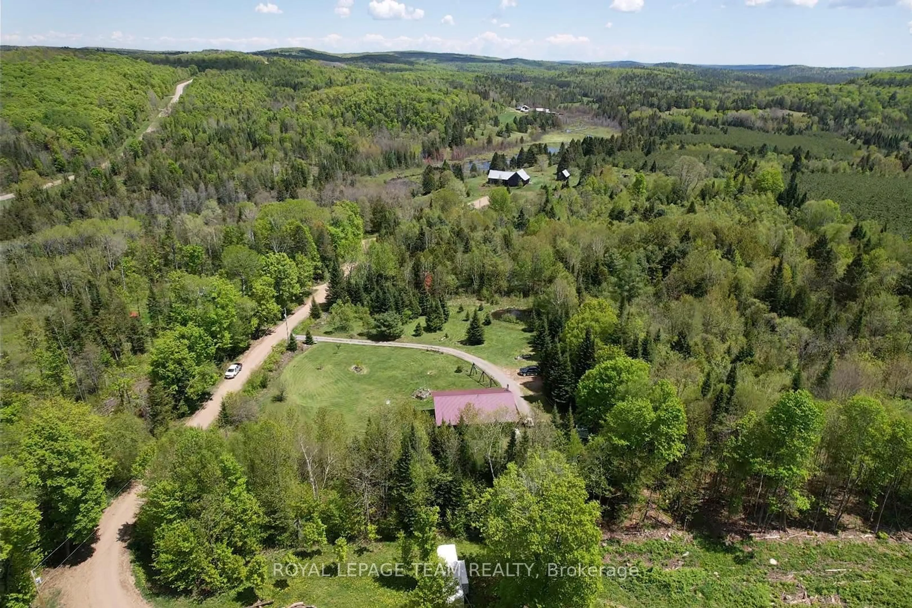 A pic from outside/outdoor area/front of a property/back of a property/a pic from drone, forest/trees view for 105 Heins Rd, Palmer Rapids Ontario K0J 2E0
