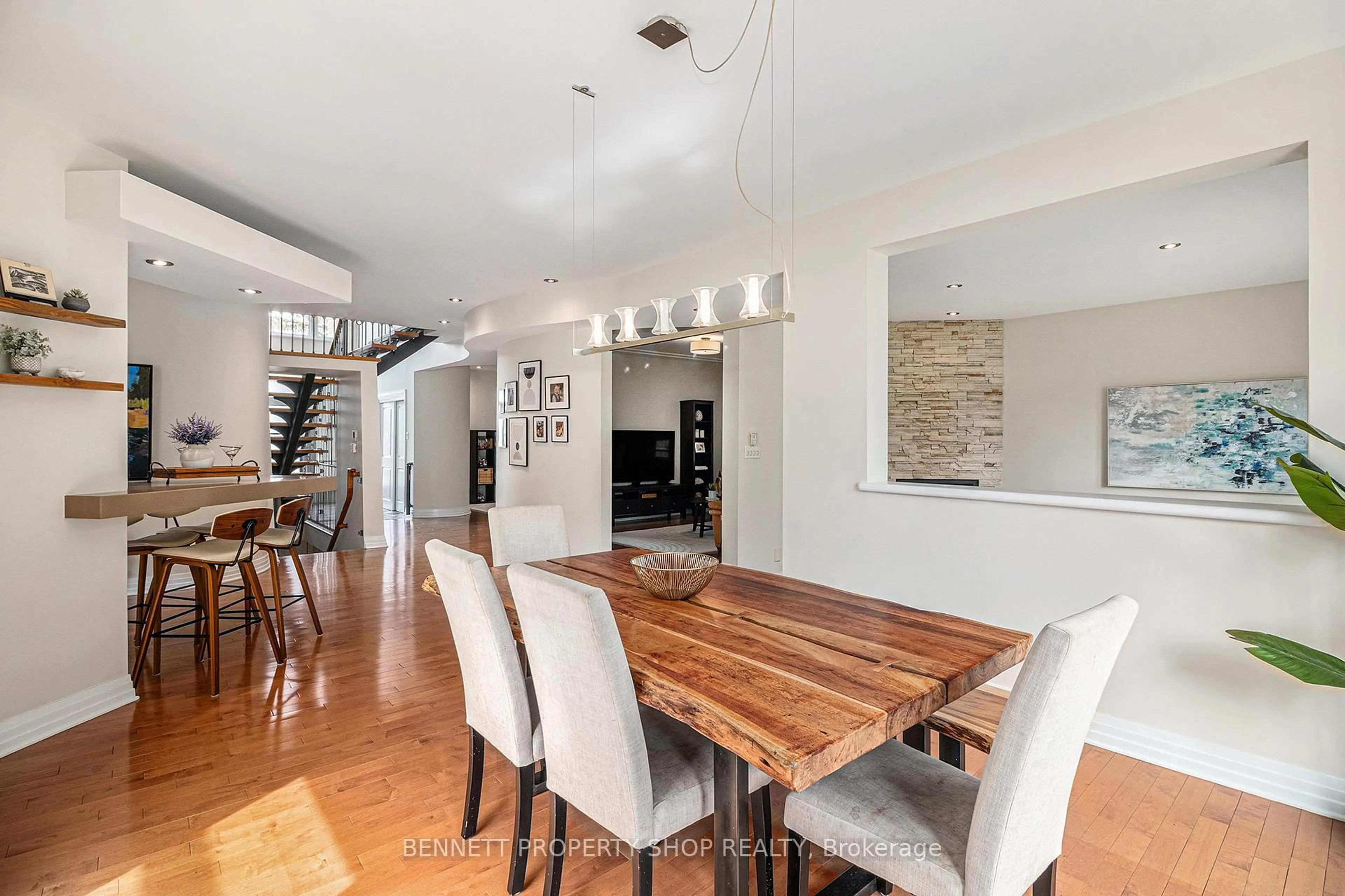 Dining room, wood/laminate floor for 1934 Lenester Ave, Ottawa Ontario K2A 1J9