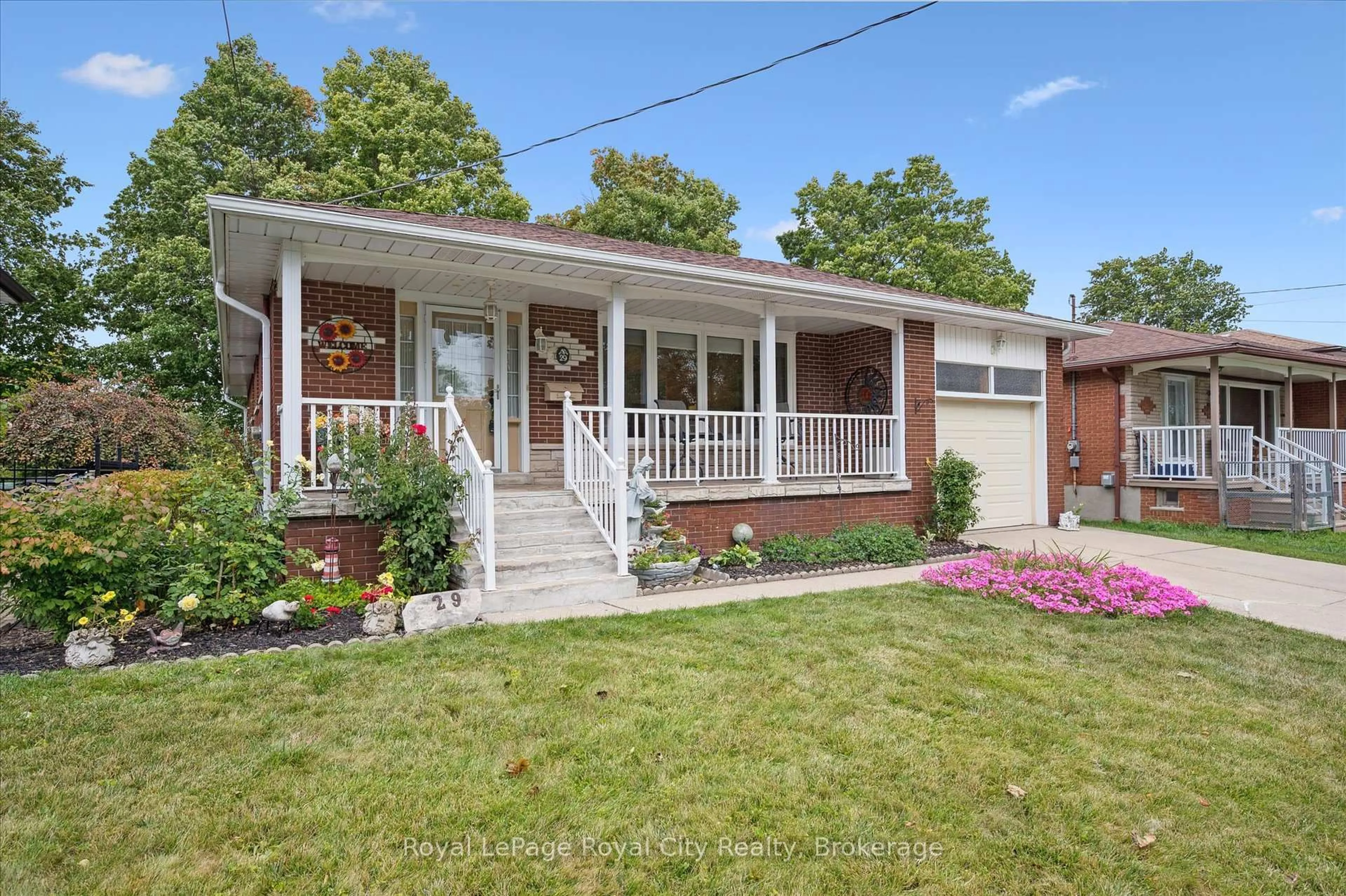 Home with brick exterior material, street for 29 Algoma Dr, Guelph Ontario N1E 1C8