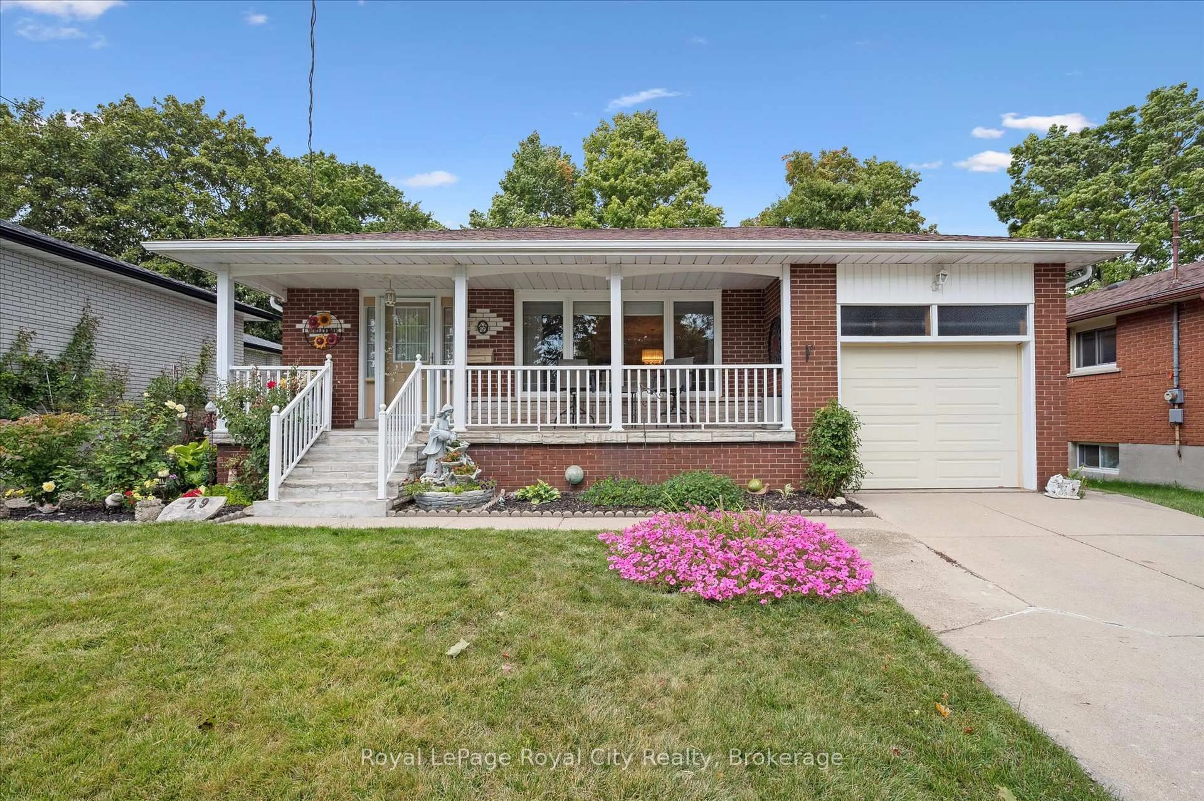 Home with vinyl exterior material, street for 29 Algoma Dr, Guelph Ontario N1E 1C8