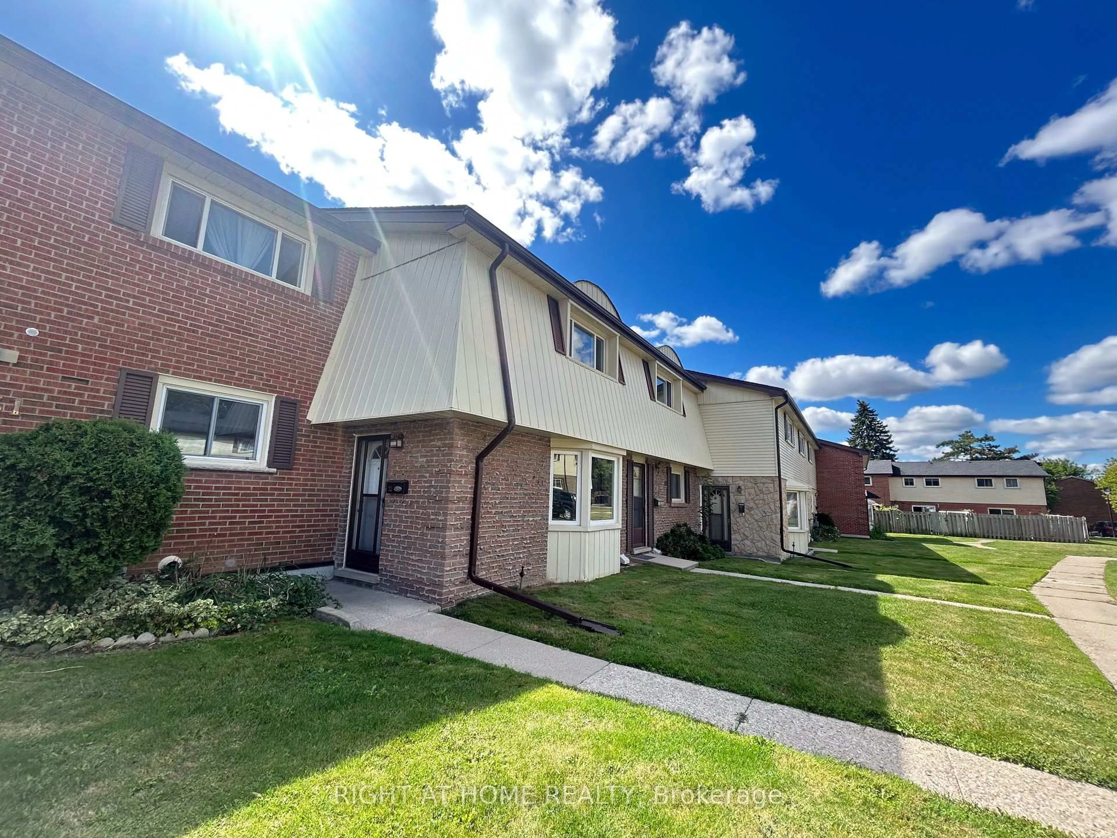 A pic from outside/outdoor area/front of a property/back of a property/a pic from drone, street for 160 Jansen Ave #32, Kitchener Ontario N2A 2L7