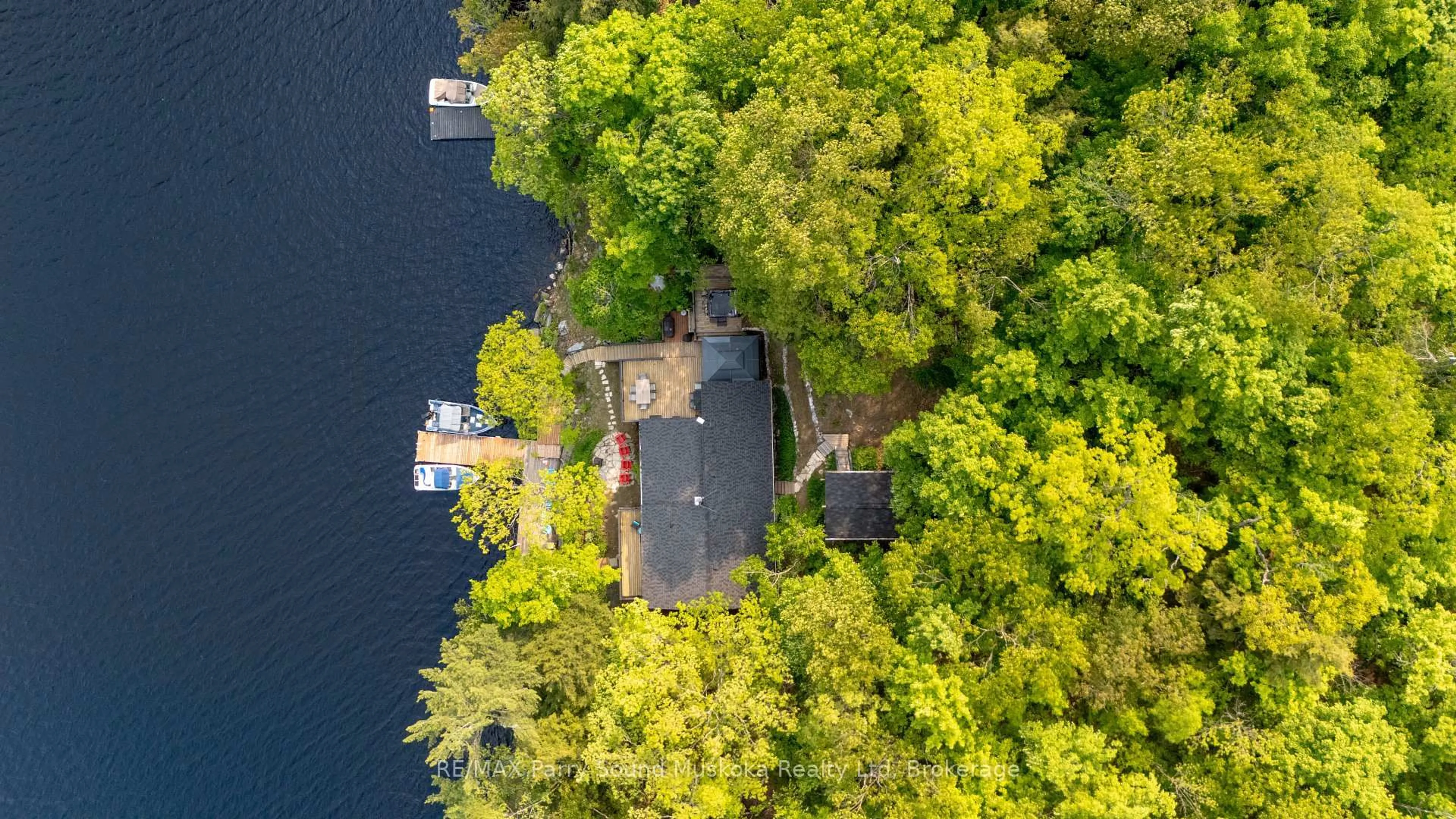 A pic from outside/outdoor area/front of a property/back of a property/a pic from drone, water/lake/river/ocean view for 362 Healey Lake, The Archipelago Ontario P0G 1C0