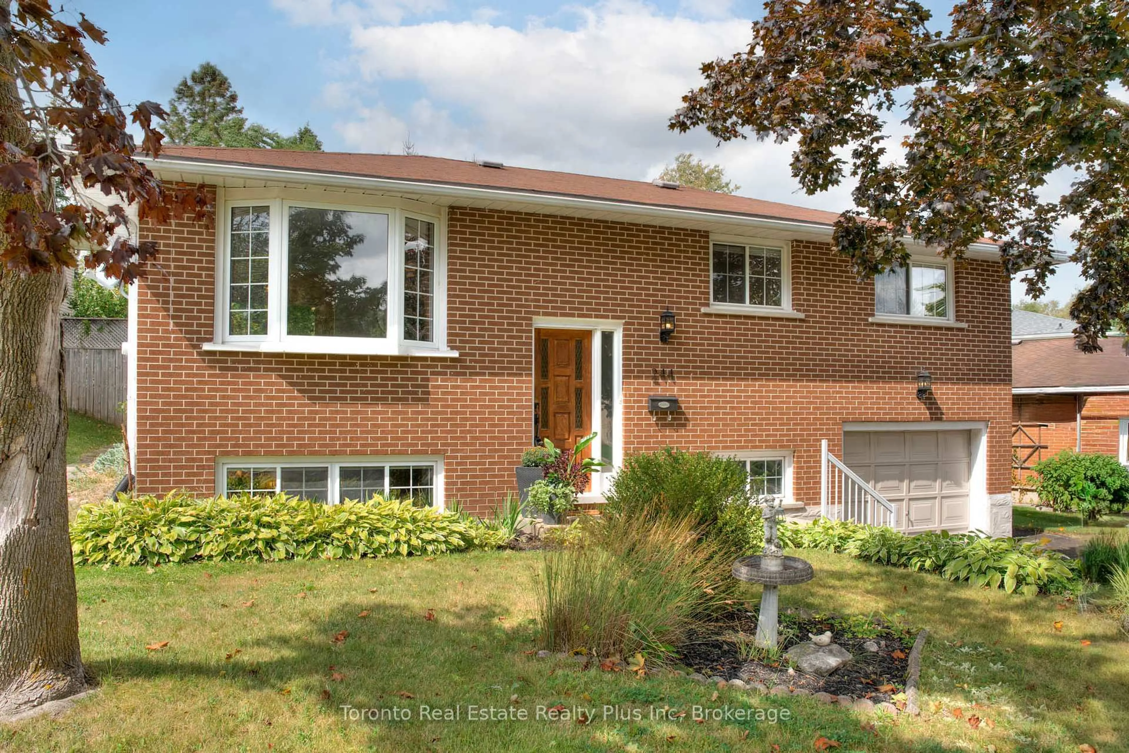 Home with brick exterior material, street for 244 Westwood Dr, Kitchener Ontario N2M 2L2
