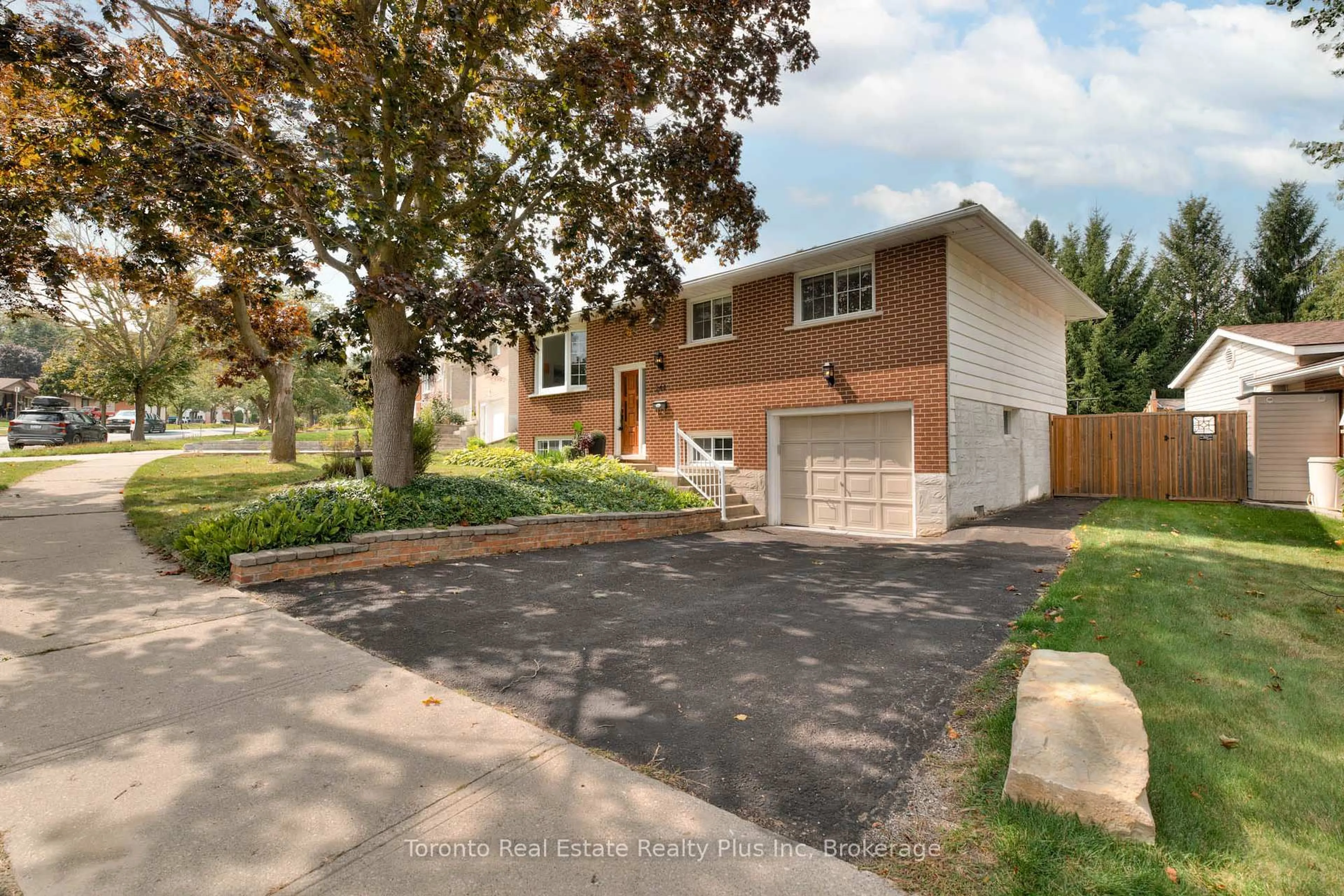 Home with brick exterior material, street for 244 Westwood Dr, Kitchener Ontario N2M 2L2