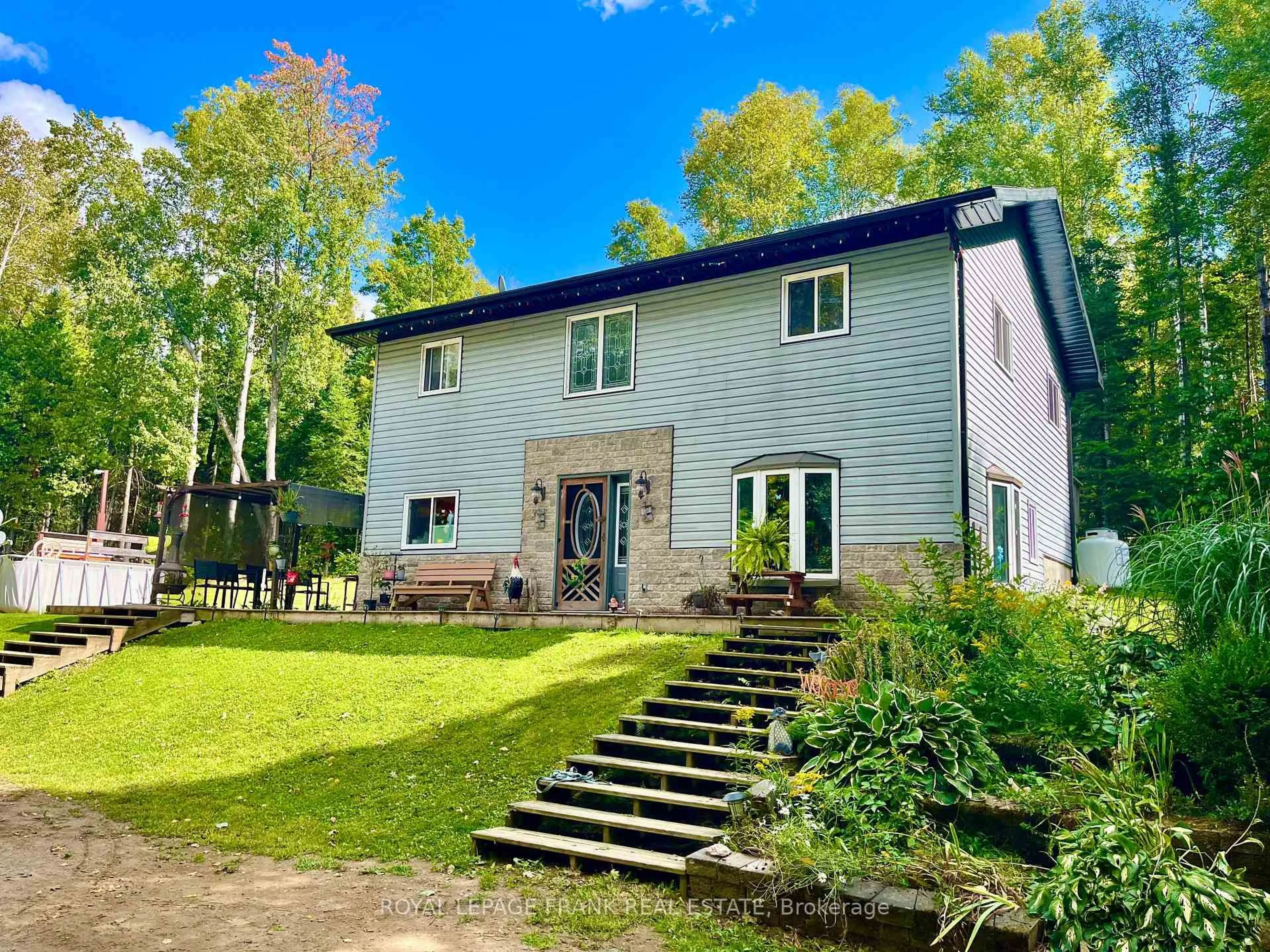 A pic from outside/outdoor area/front of a property/back of a property/a pic from drone, unknown for 1630 Musclow Greenview Rd, Bancroft Ontario K0L 1C0