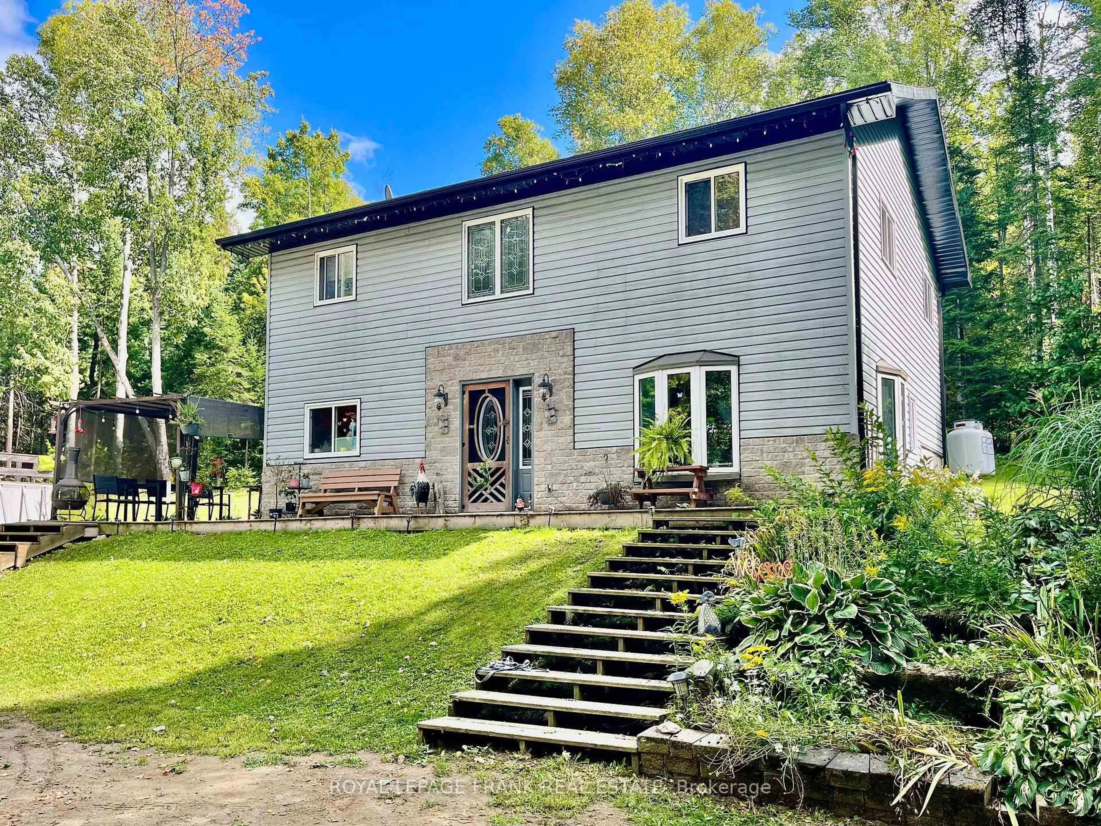 A pic from outside/outdoor area/front of a property/back of a property/a pic from drone, unknown for 1630 Musclow Greenview Rd, Bancroft Ontario K0L 1C0