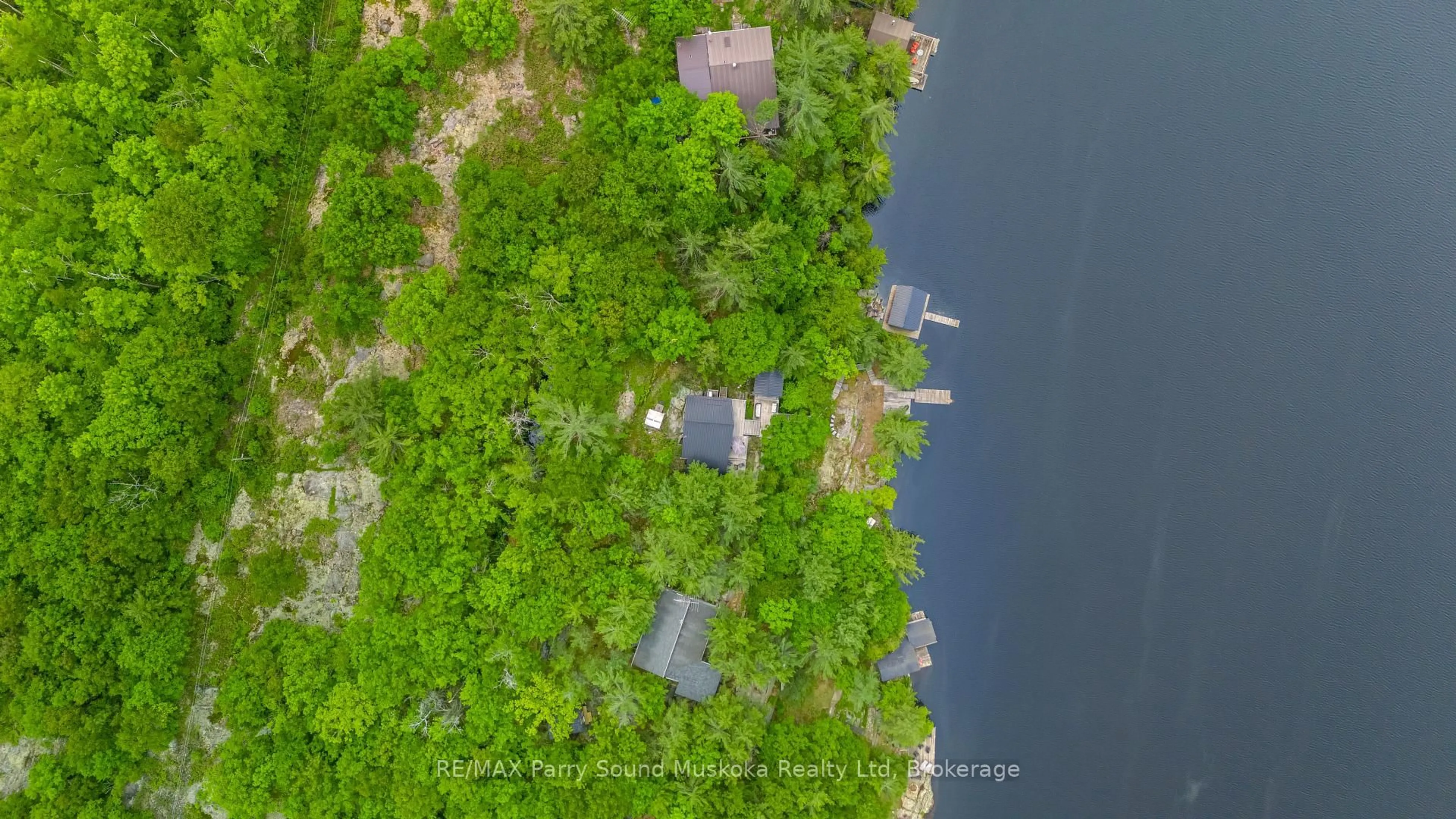 A pic from outside/outdoor area/front of a property/back of a property/a pic from drone, water/lake/river/ocean view for 109 Healey Lake, The Archipelago Ontario P0G 1G0