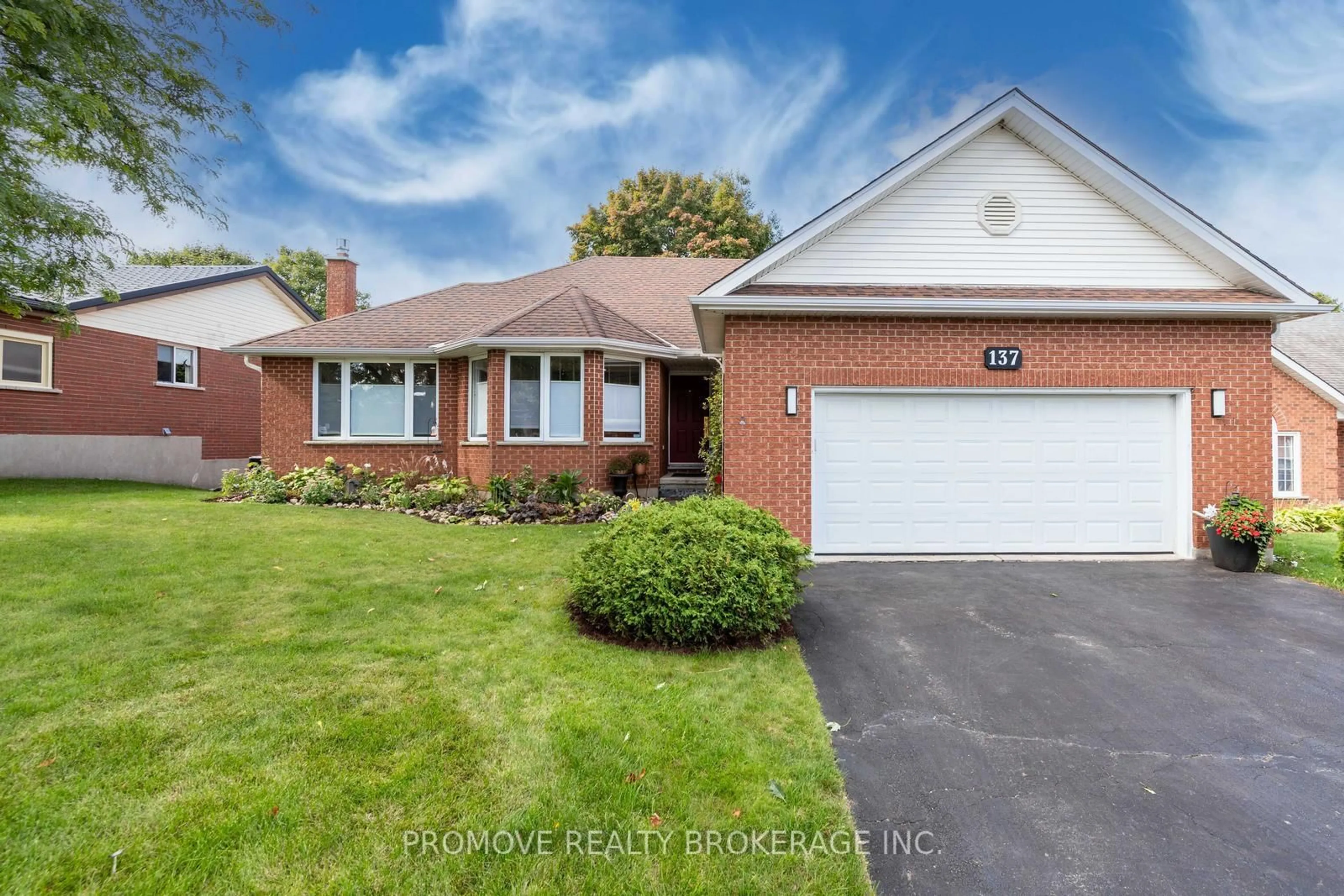 Home with brick exterior material, street for 137 Lou's Blvd, Guelph/Eramosa Ontario N0B 2K0