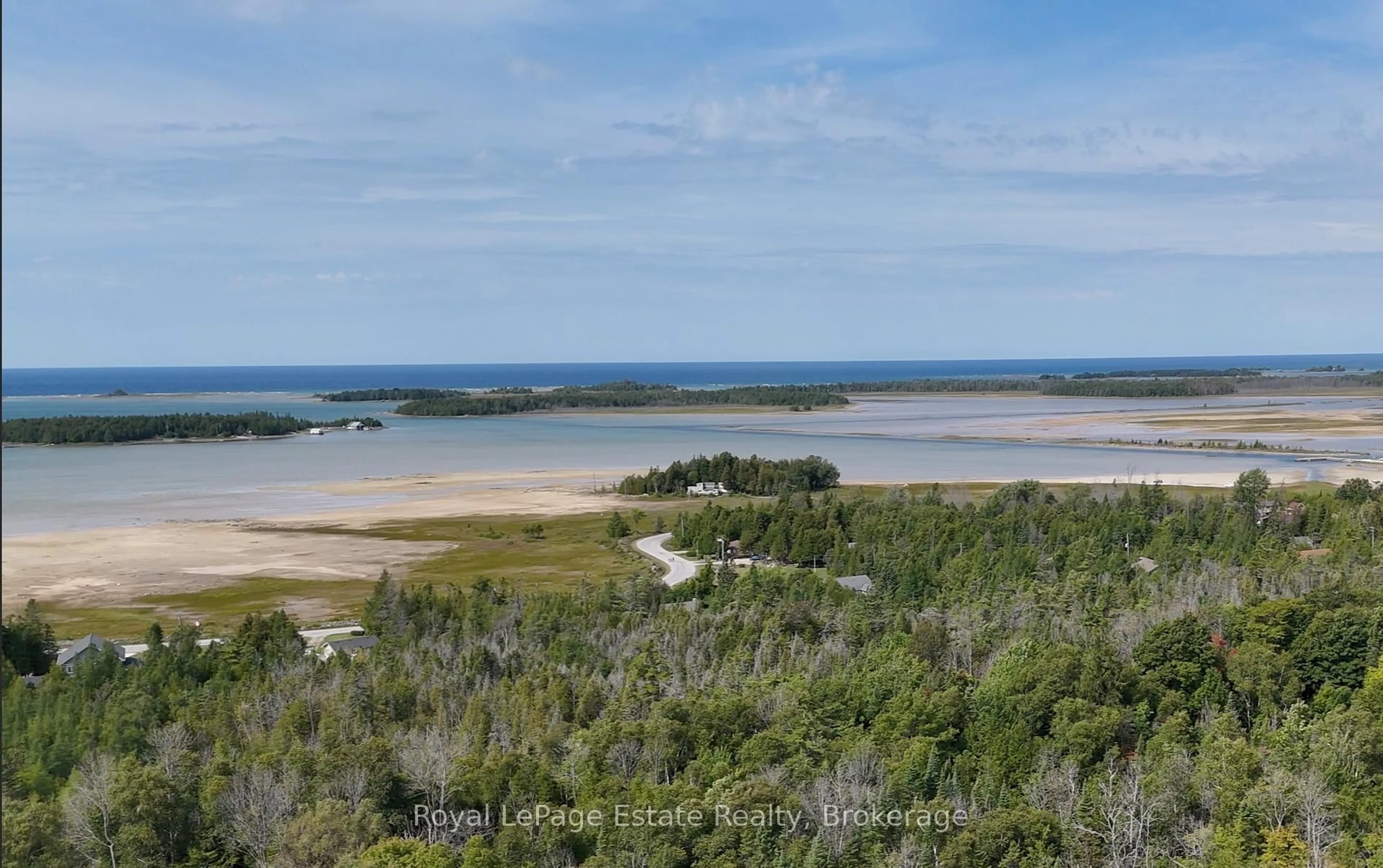 A pic from outside/outdoor area/front of a property/back of a property/a pic from drone, water/lake/river/ocean view for 44 Whitefish Blvd, South Bruce Peninsula Ontario N0H 2T0