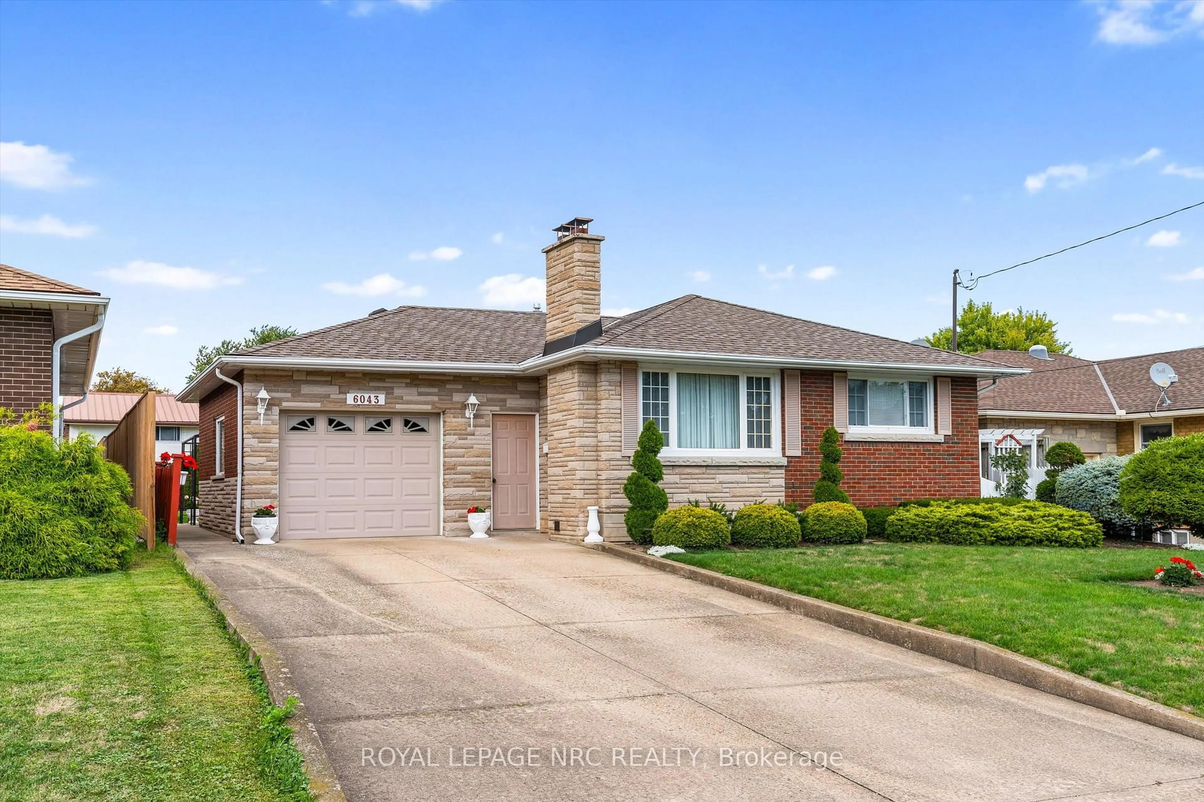 Home with brick exterior material, street for 6043 Mayfair Dr, Niagara Falls Ontario L2J 1V7
