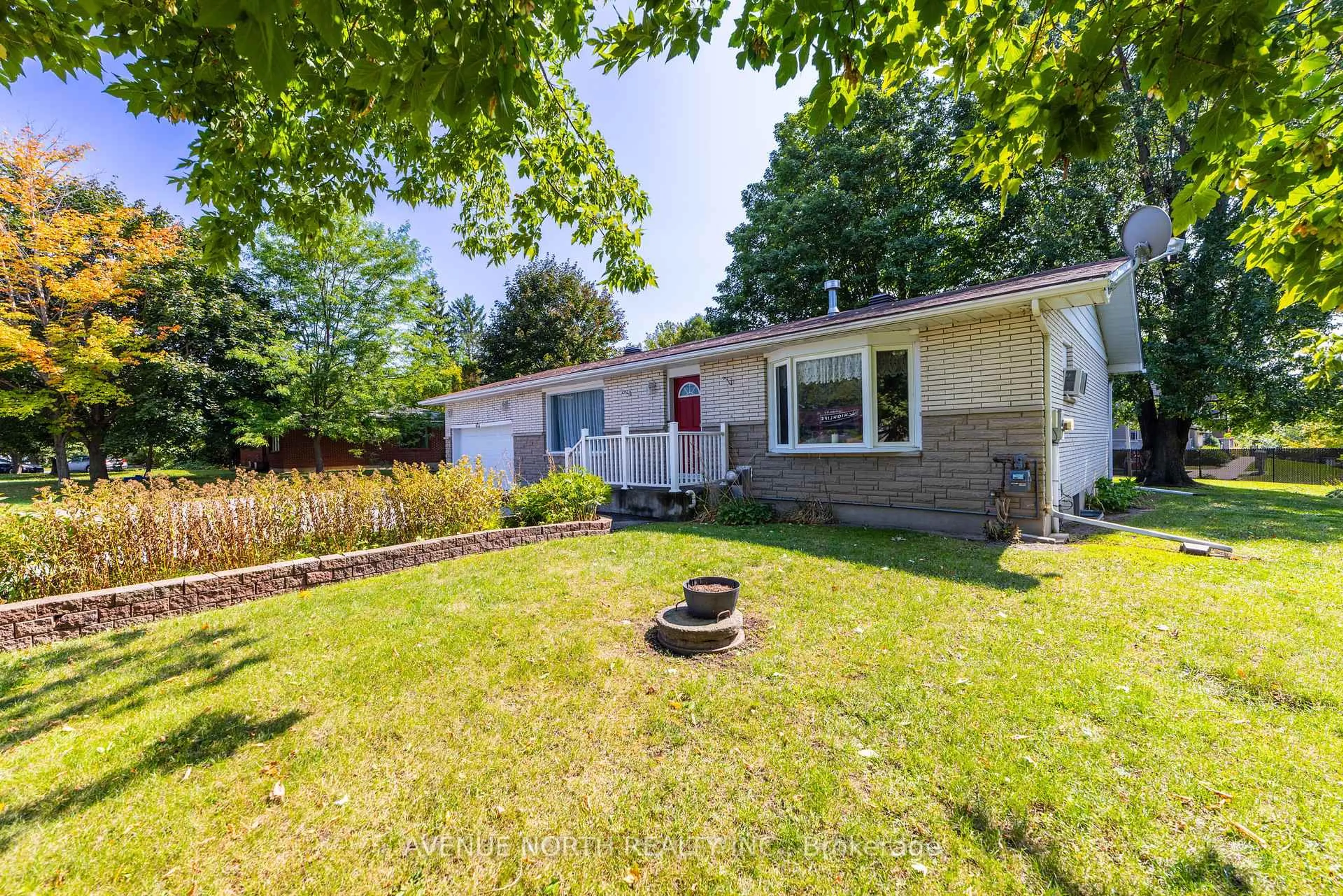 Home with vinyl exterior material, street for 832 Notre Dame St, Russell Ontario K0A 1W1