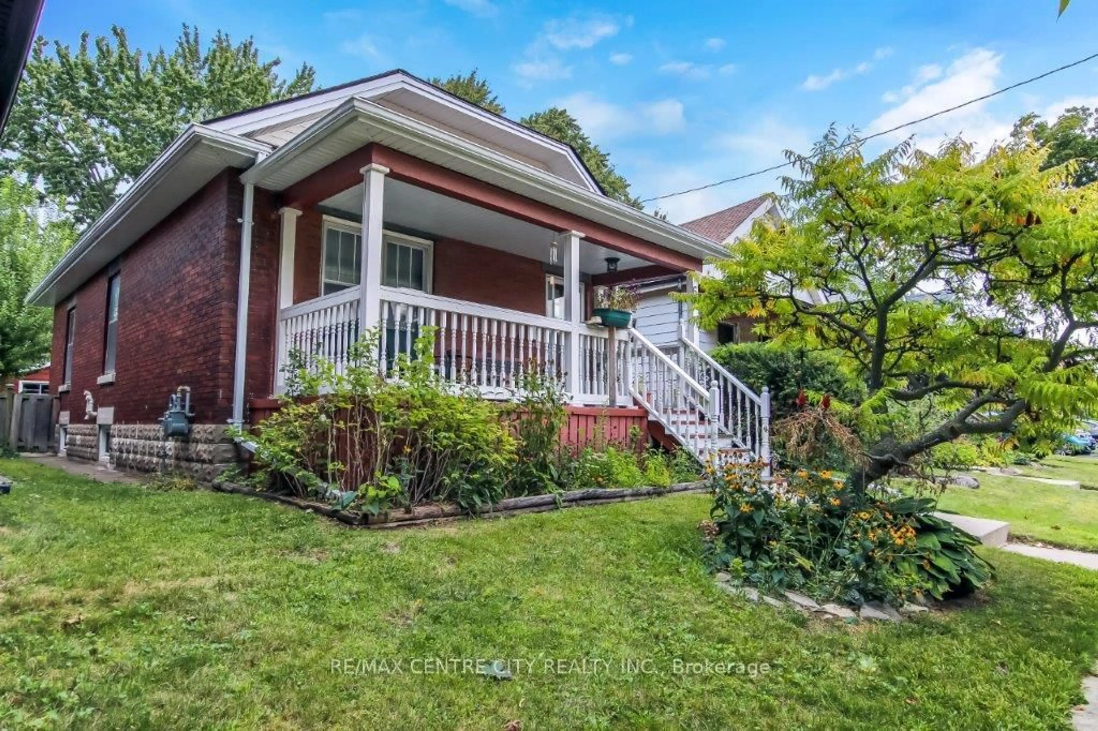 Home with brick exterior material, street for 66 Connaught Ave, London East Ontario N5Y 3A6