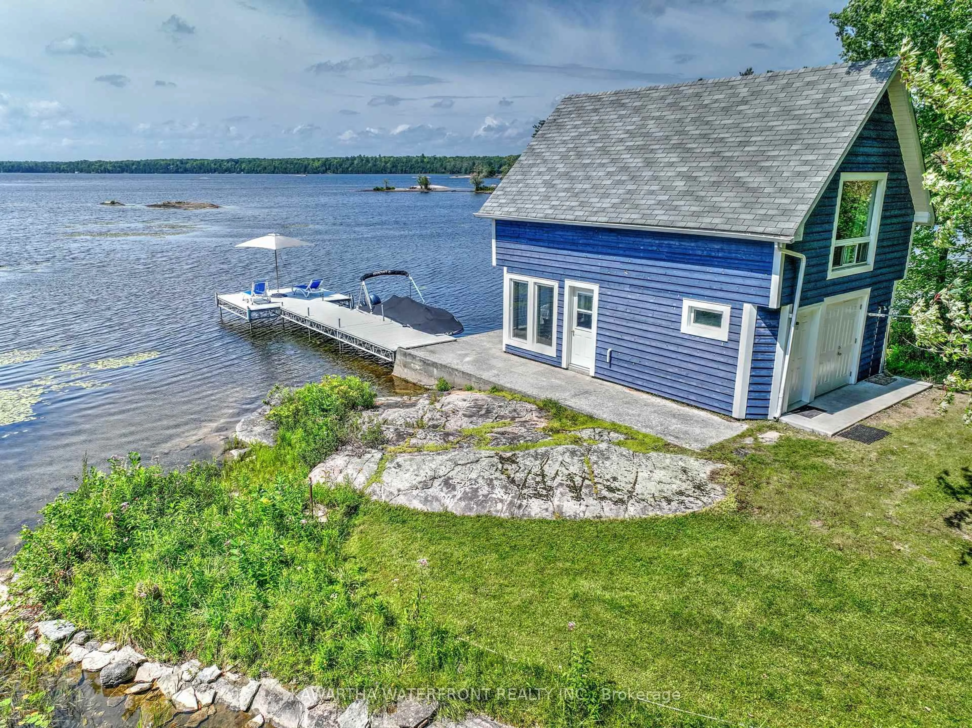 A pic from outside/outdoor area/front of a property/back of a property/a pic from drone, water/lake/river/ocean view for 11 Woodworth Dr, Kawartha Lakes Ontario K0M 1A0