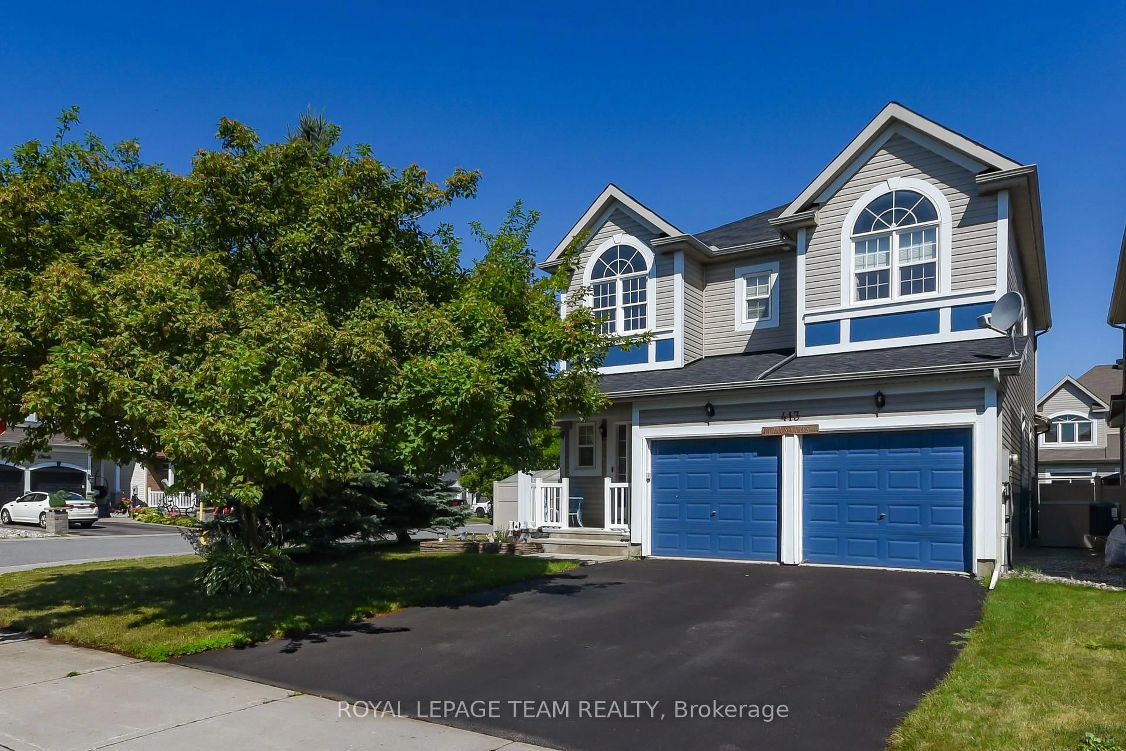 Home with vinyl exterior material, street for 413 Tartaruga Lane, Ottawa Ontario K2J 0E2