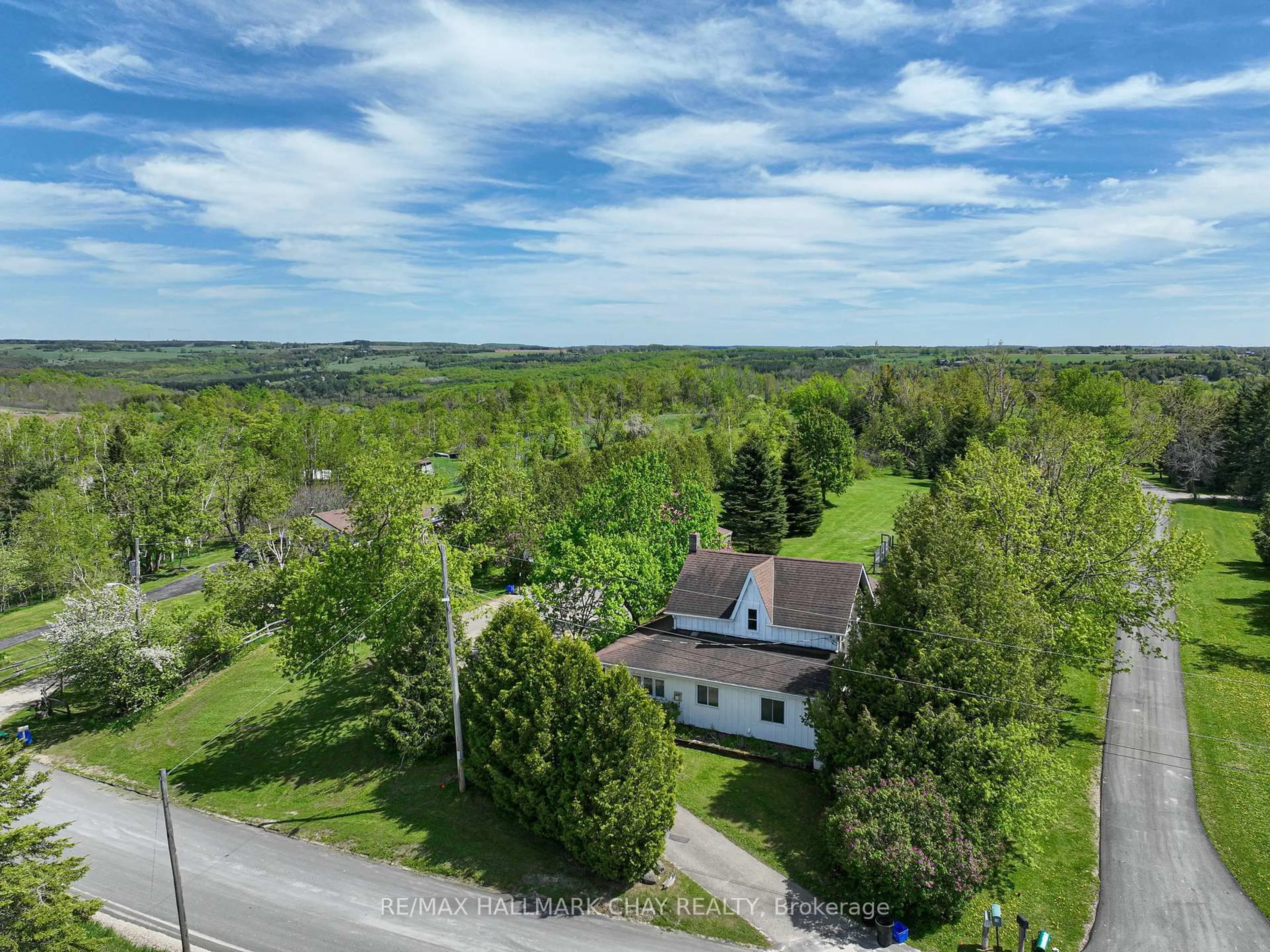 A pic from outside/outdoor area/front of a property/back of a property/a pic from drone, unknown for 22 Mill Lane, Melancthon Ontario L9V 2T9