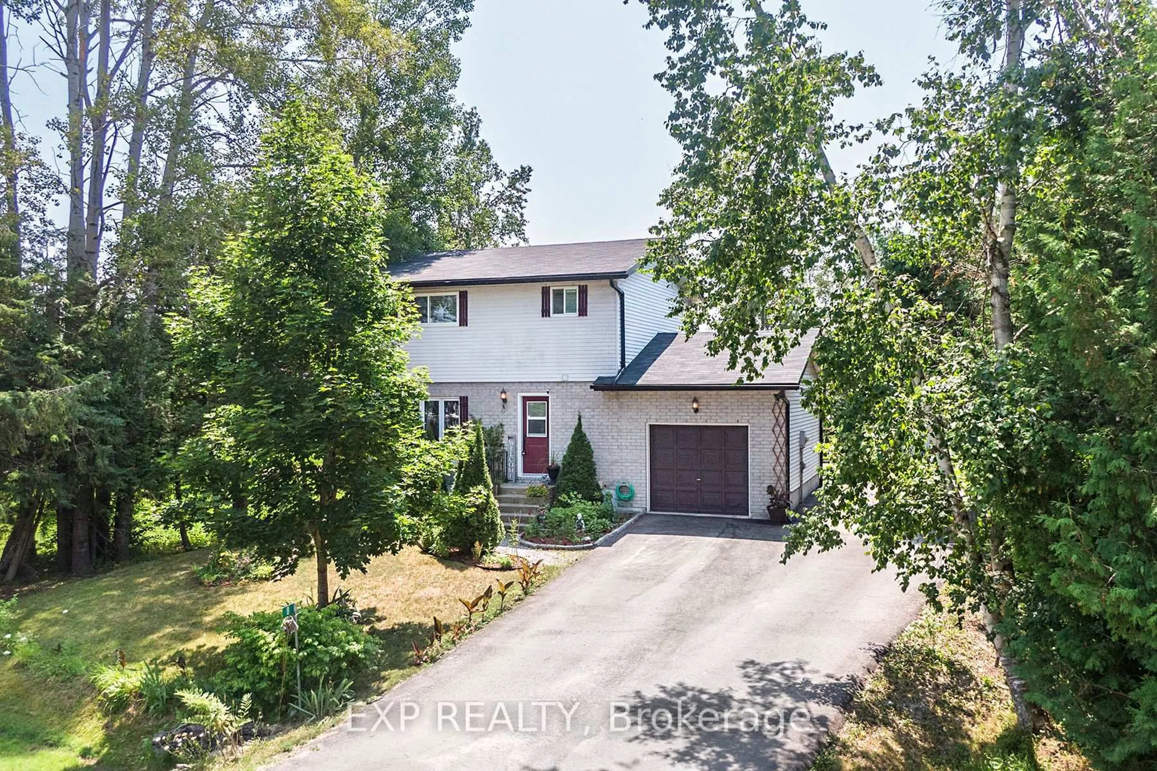 A pic from outside/outdoor area/front of a property/back of a property/a pic from drone, street for 8 Pinewood Blvd, Kawartha Lakes Ontario K0M 2T0