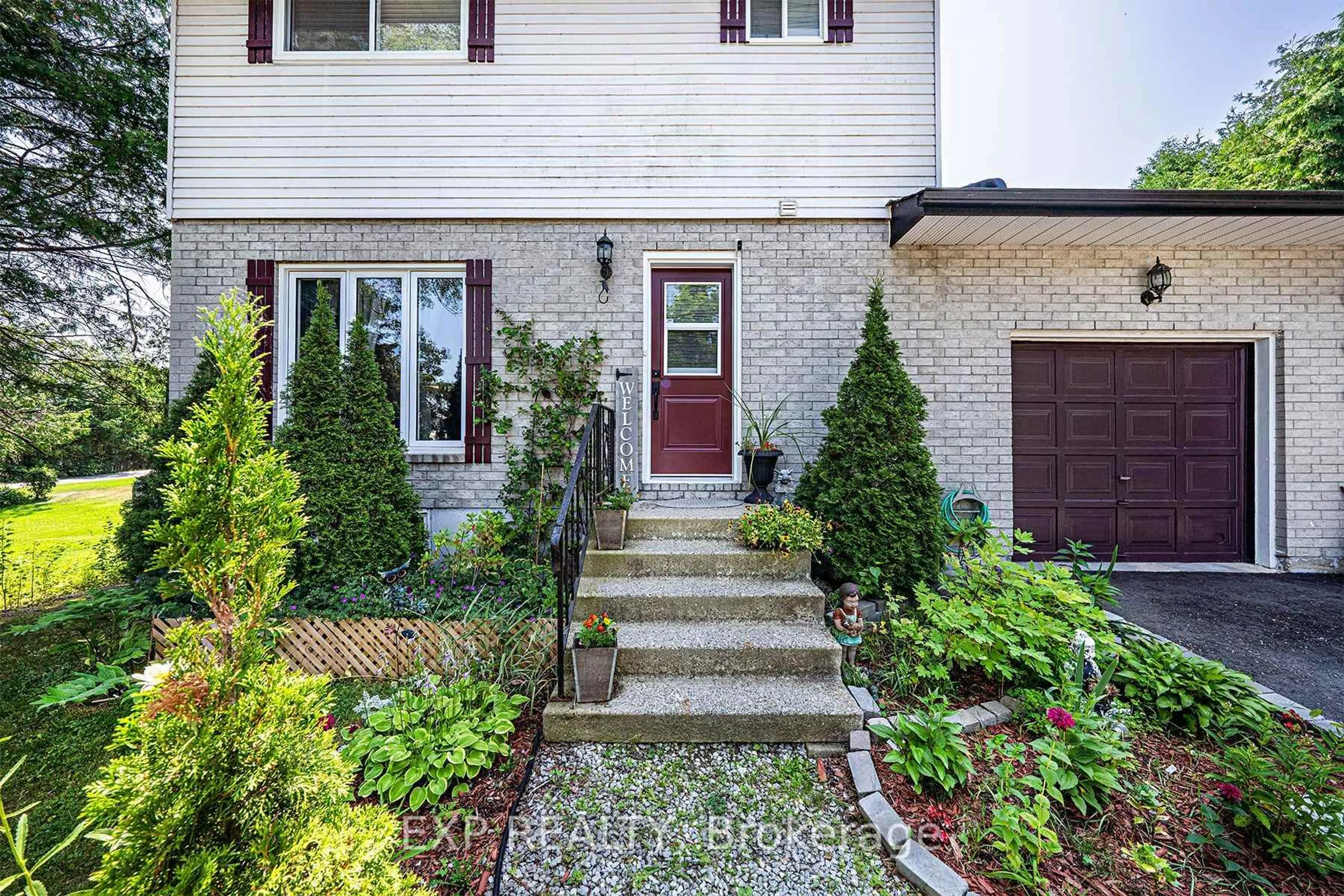 Home with brick exterior material, street for 8 Pinewood Blvd, Kawartha Lakes Ontario K0M 2T0