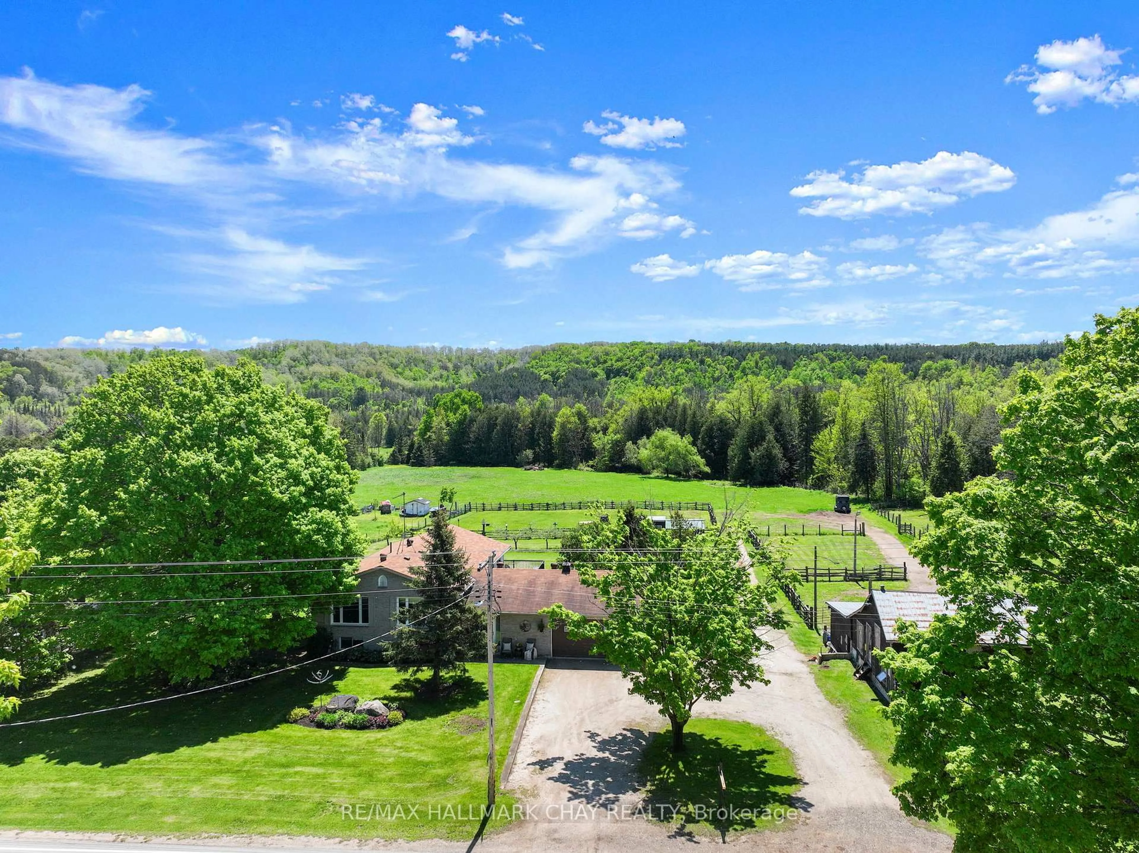 A pic from outside/outdoor area/front of a property/back of a property/a pic from drone, forest/trees view for 667280 20th Sdrd, Mulmur Ontario L9V 0V6