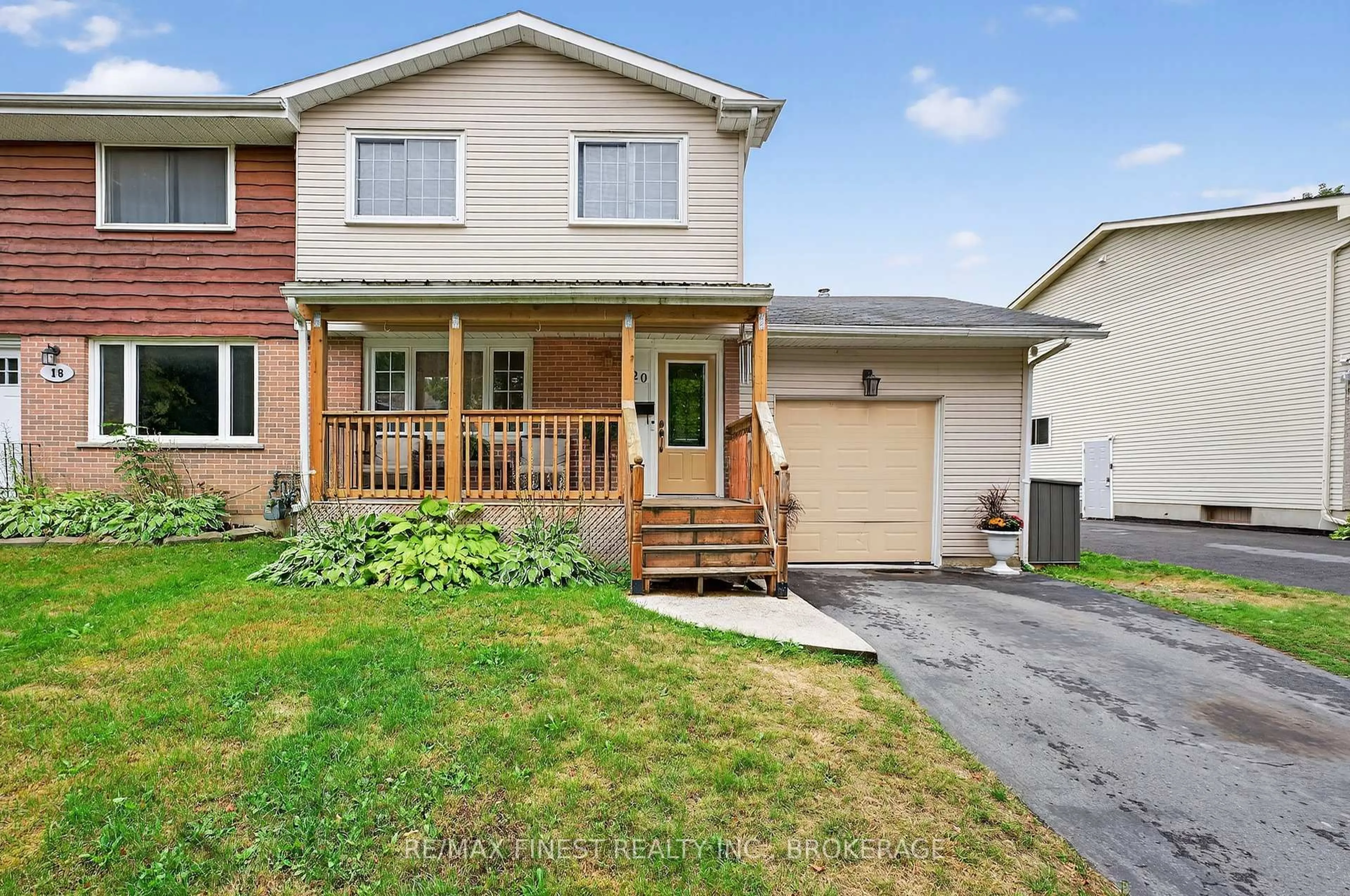 Home with vinyl exterior material, street for 20 Carriage Court Ave, Kingston Ontario K7K 5X2