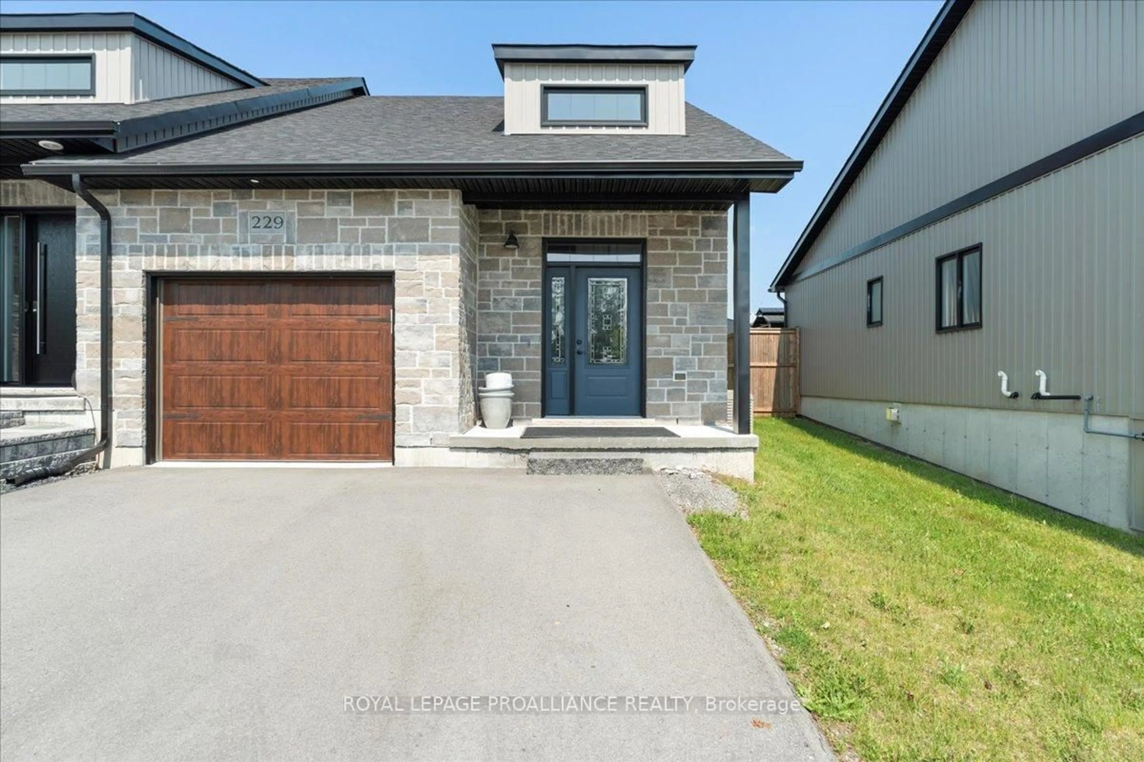 Home with brick exterior material, street for 229 Baker St, Stirling Ontario K0K 3E0