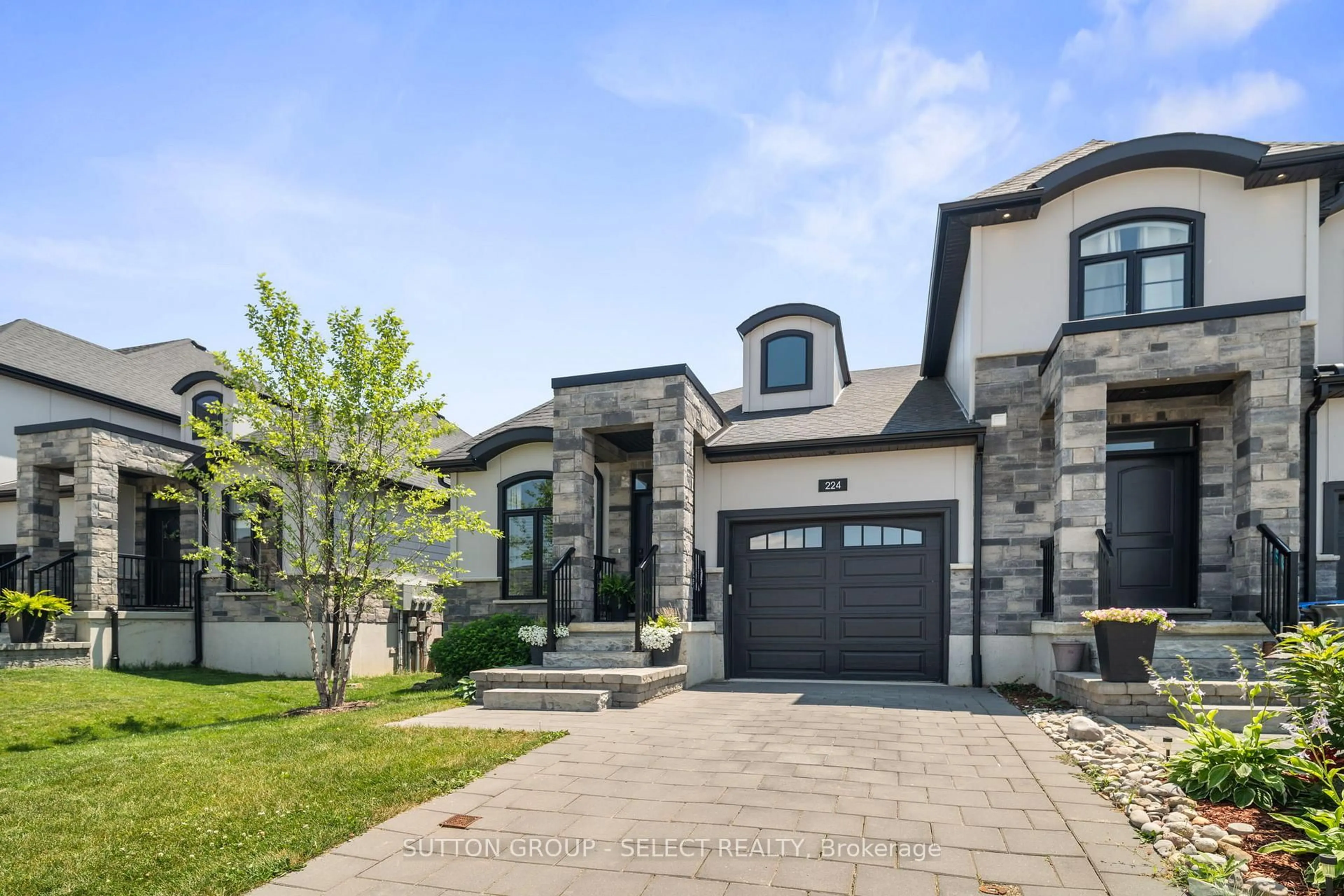 Home with brick exterior material, street for 224 Doan Dr, Middlesex Centre Ontario N0L 1R0