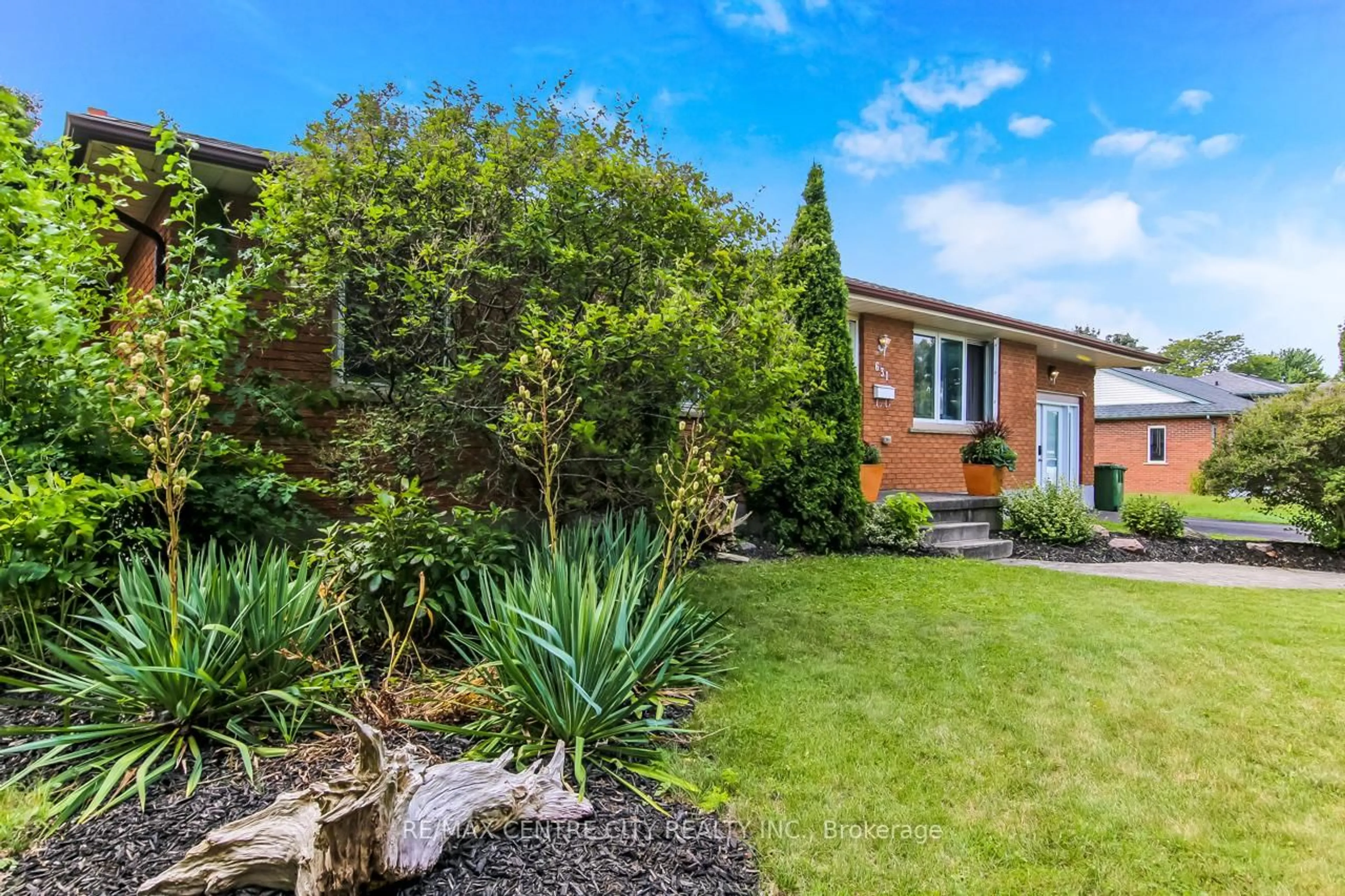 Home with brick exterior material, street for 631 Elm St, St. Thomas Ontario N5R 1K9
