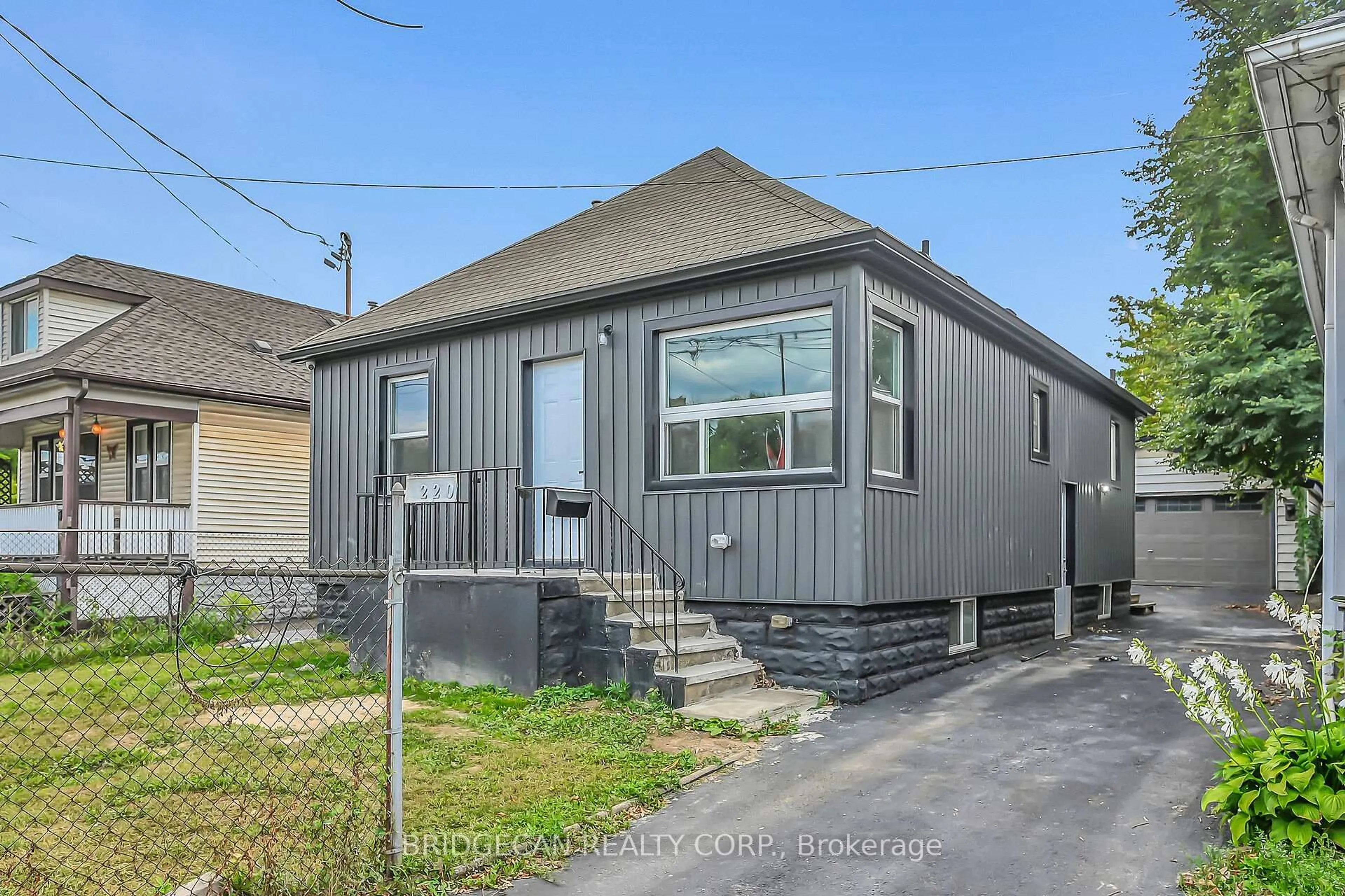 Home with vinyl exterior material, street for 220 GRENFFEL St, Hamilton Ontario L8H 3J7