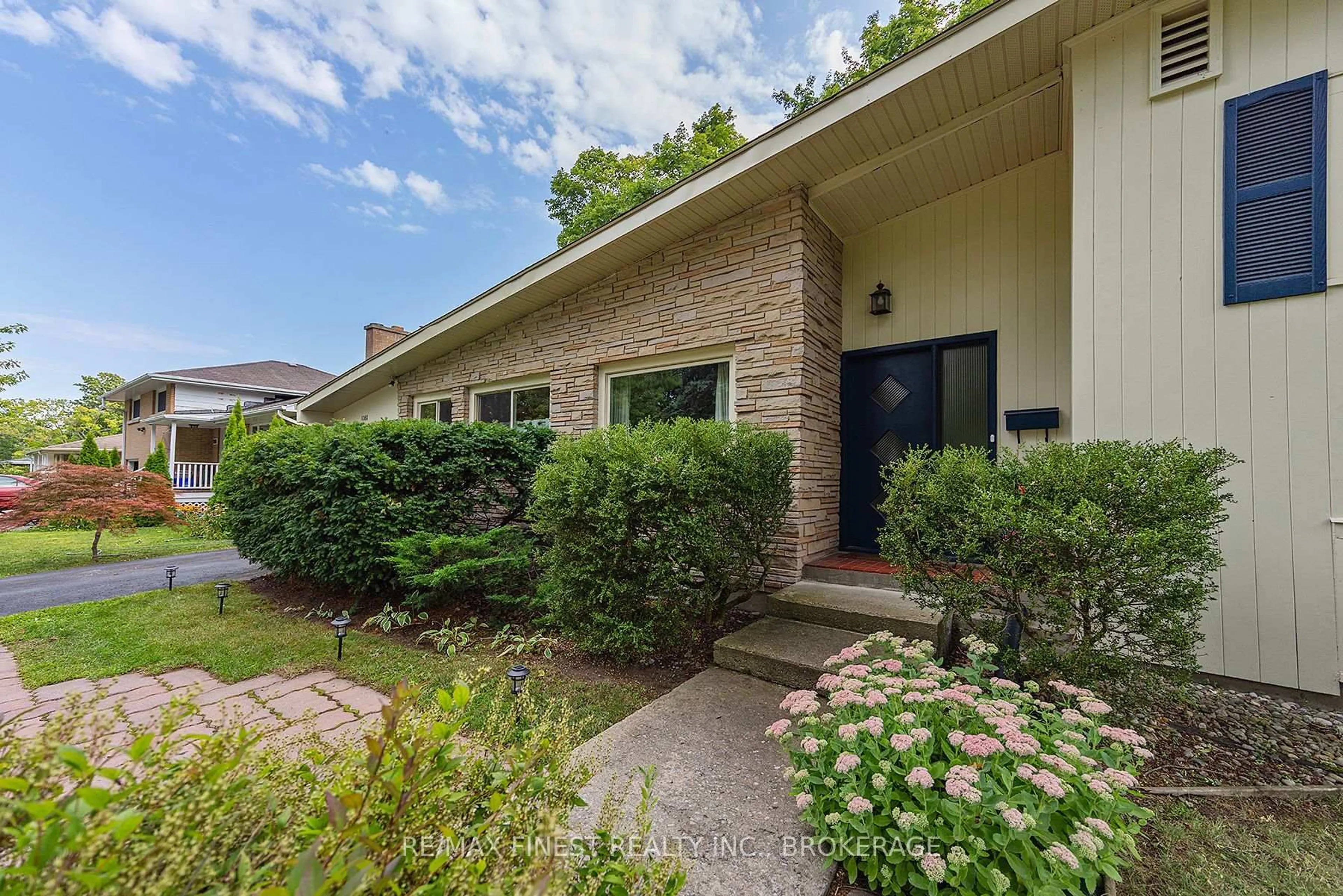 Home with brick exterior material, street for 1088 Johnson St, Kingston Ontario K7M 2N5