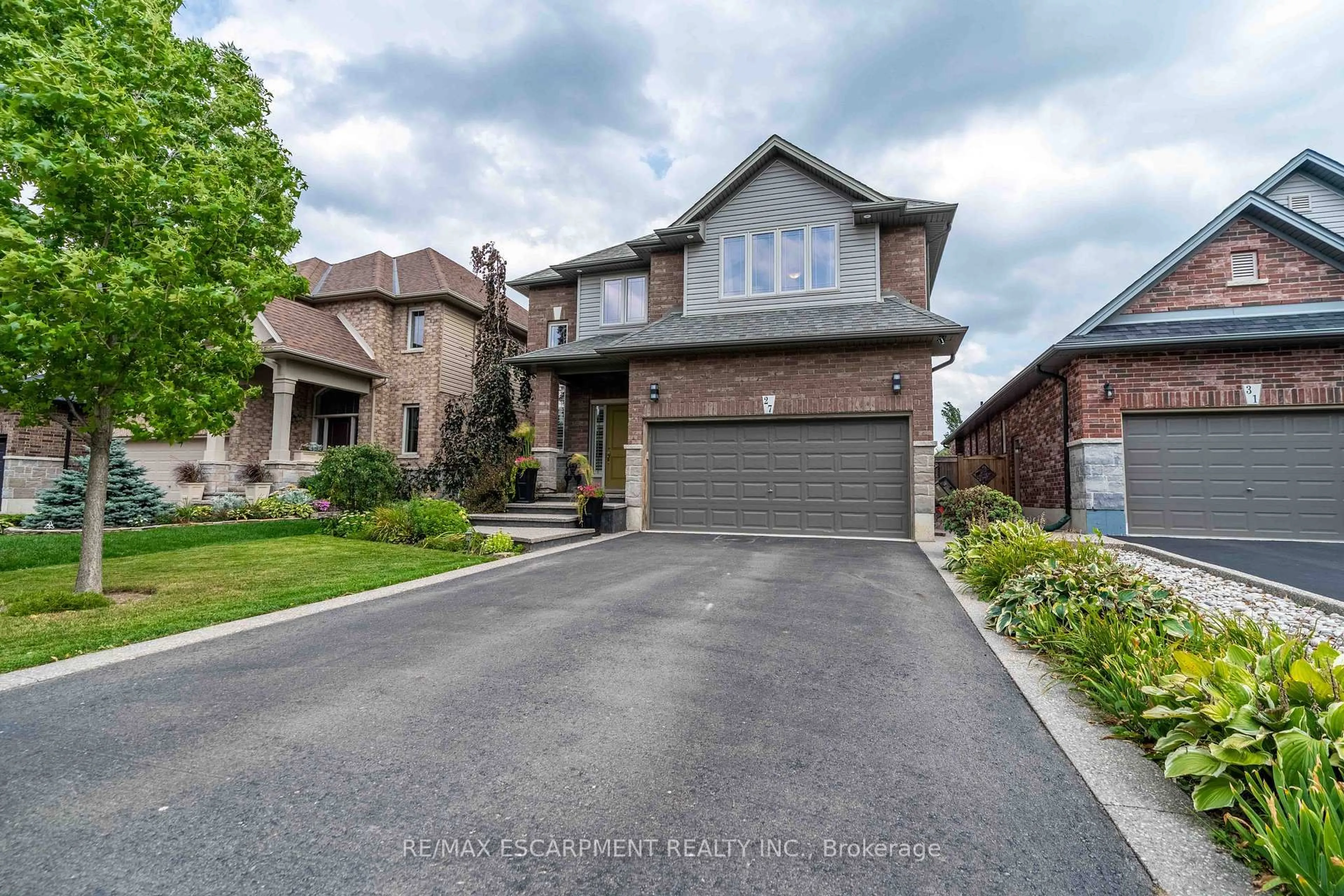 Home with brick exterior material, street for 27 Purnell Dr, Hamilton Ontario L9C 0C6