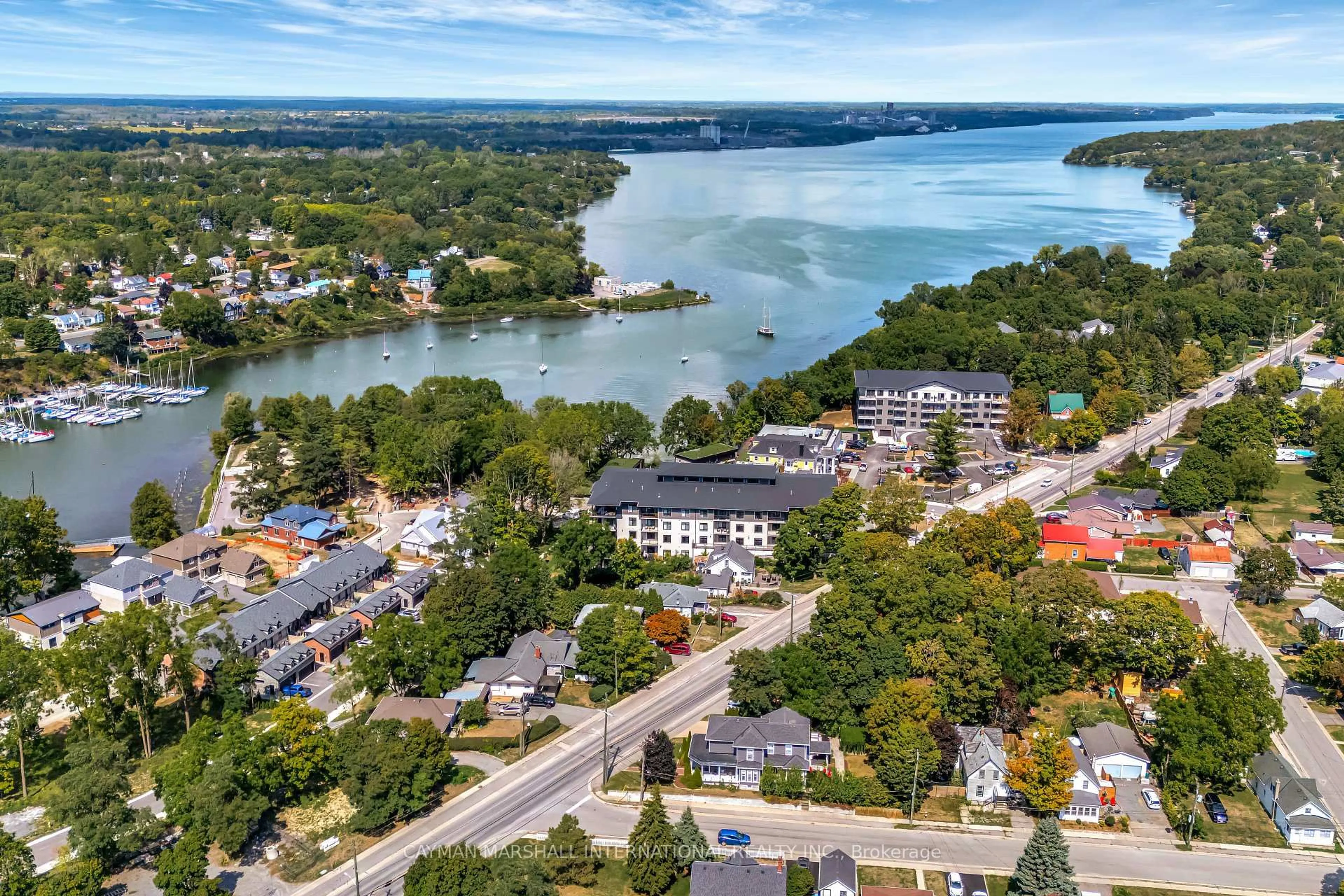 A pic from outside/outdoor area/front of a property/back of a property/a pic from drone, water/lake/river/ocean view for 17 Cleave Ave #301, Prince Edward County Ontario K0K 2T0