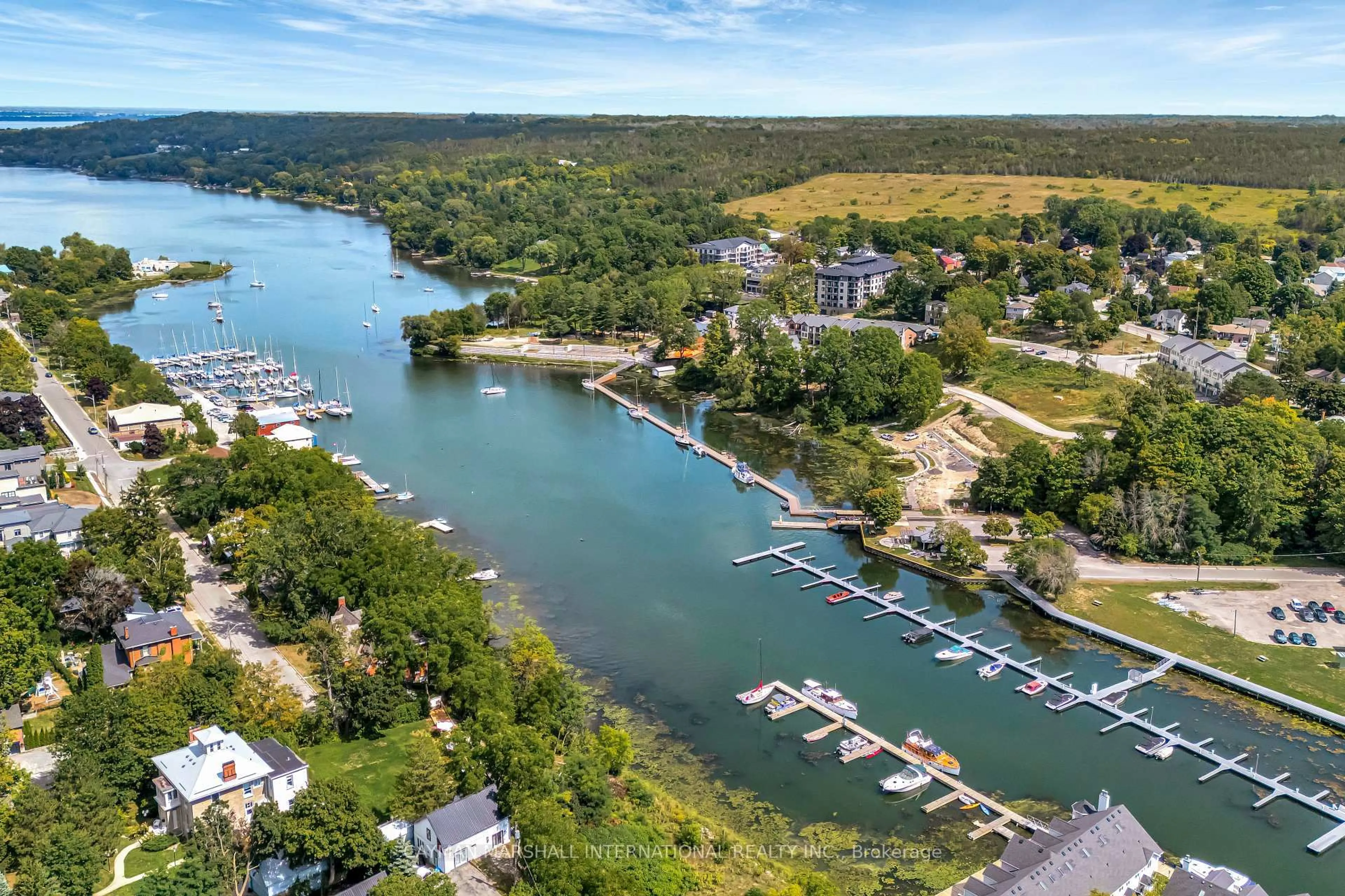 A pic from outside/outdoor area/front of a property/back of a property/a pic from drone, water/lake/river/ocean view for 17 Cleave Ave #301, Prince Edward County Ontario K0K 2T0