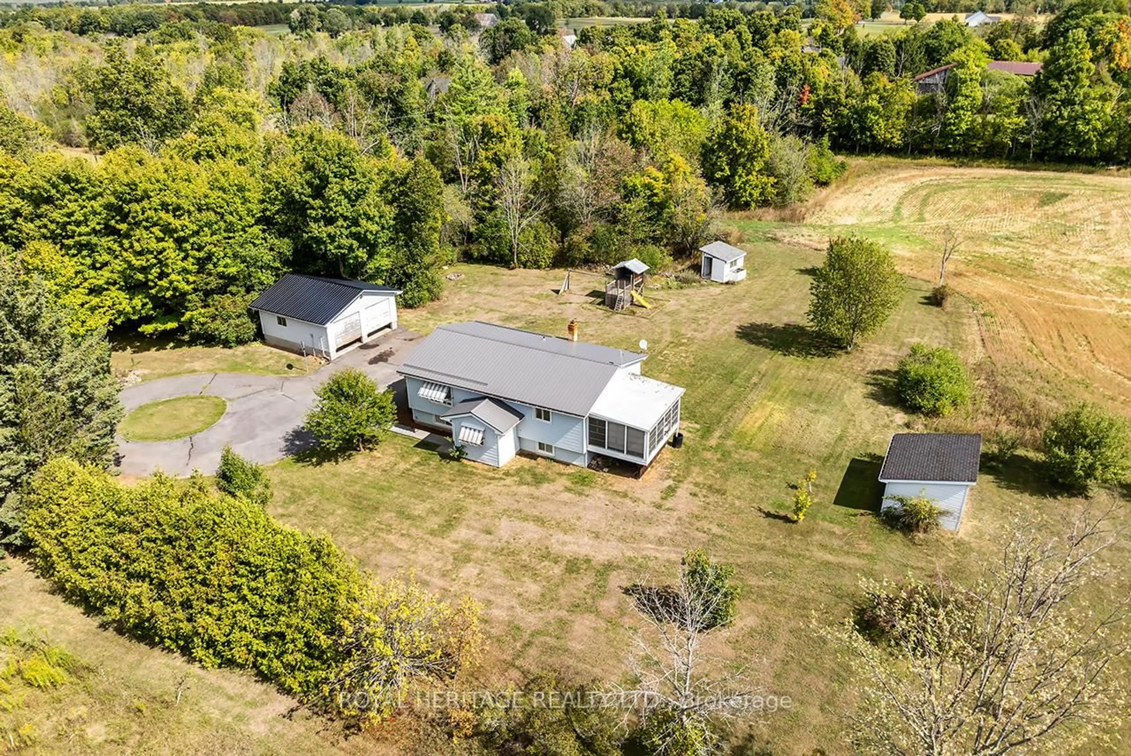 A pic from outside/outdoor area/front of a property/back of a property/a pic from drone, unknown for 1052 Moscow Rd, Yarker Ontario K0K 3N0