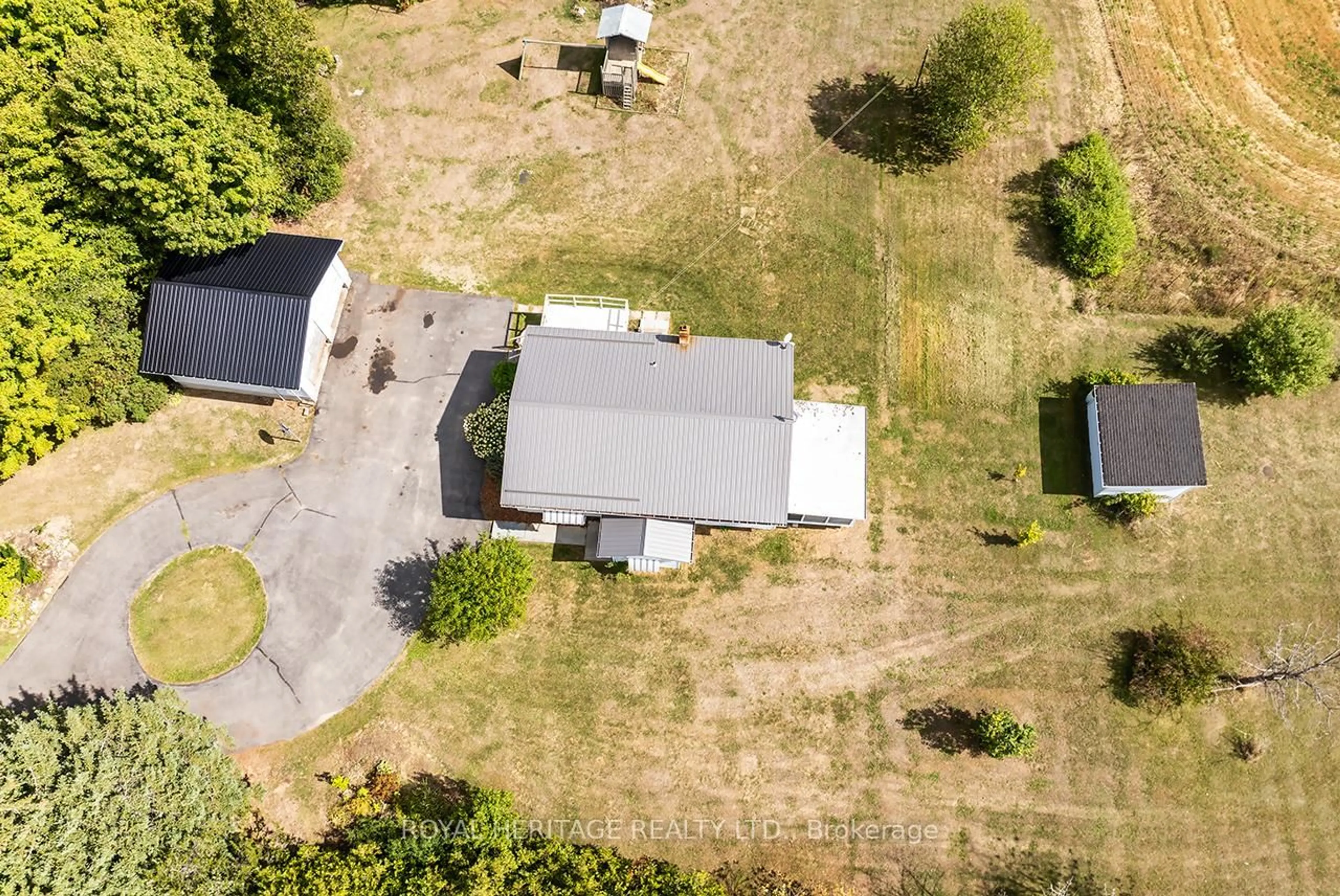 A pic from outside/outdoor area/front of a property/back of a property/a pic from drone, street for 1052 Moscow Rd, Yarker Ontario K0K 3N0