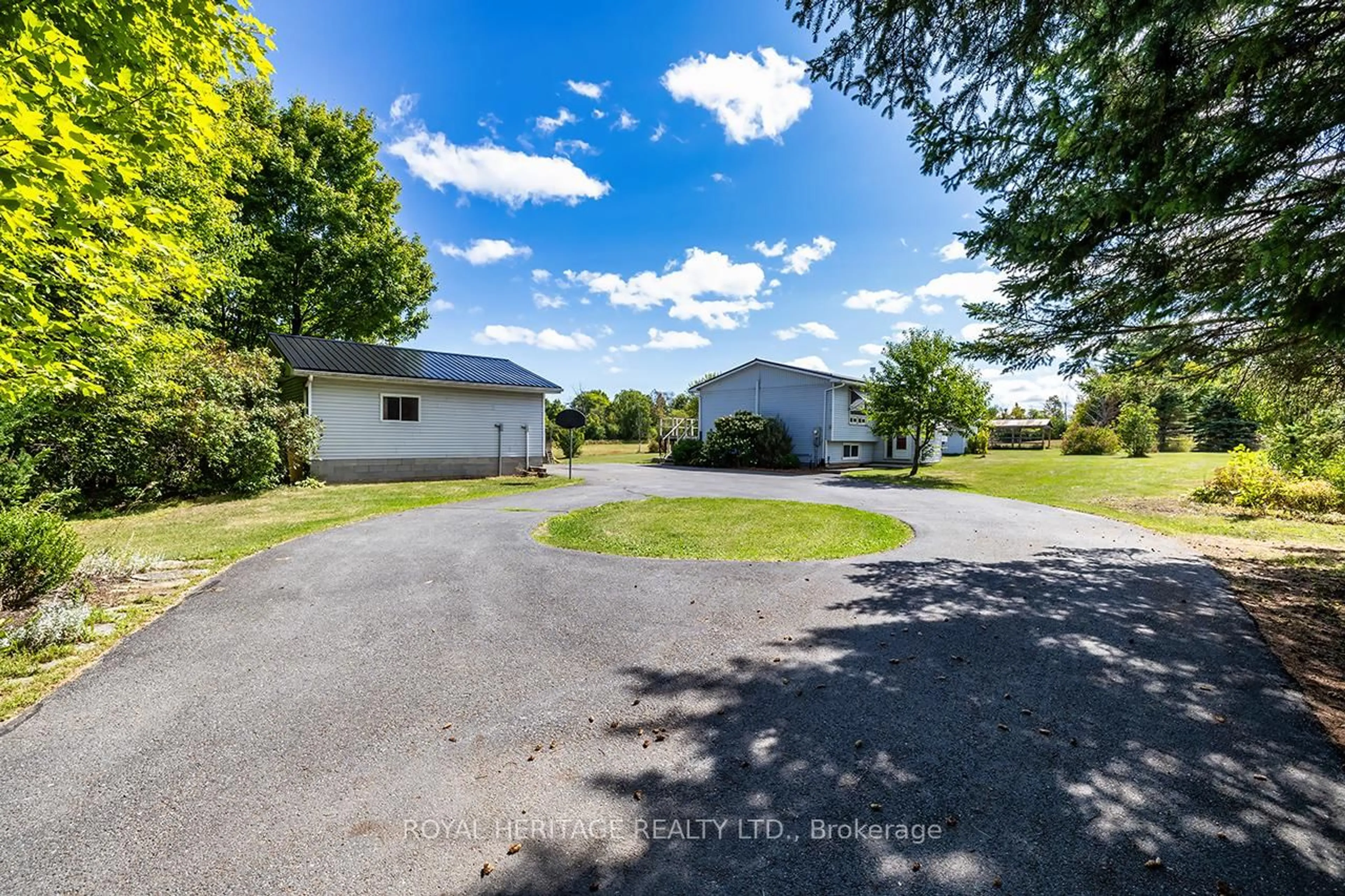 A pic from outside/outdoor area/front of a property/back of a property/a pic from drone, water/lake/river/ocean view for 1052 Moscow Rd, Yarker Ontario K0K 3N0